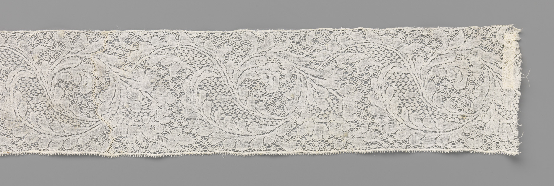 Lace work featuring an s-shaped cartouche and pear-shaped flower by Unknown Artist
