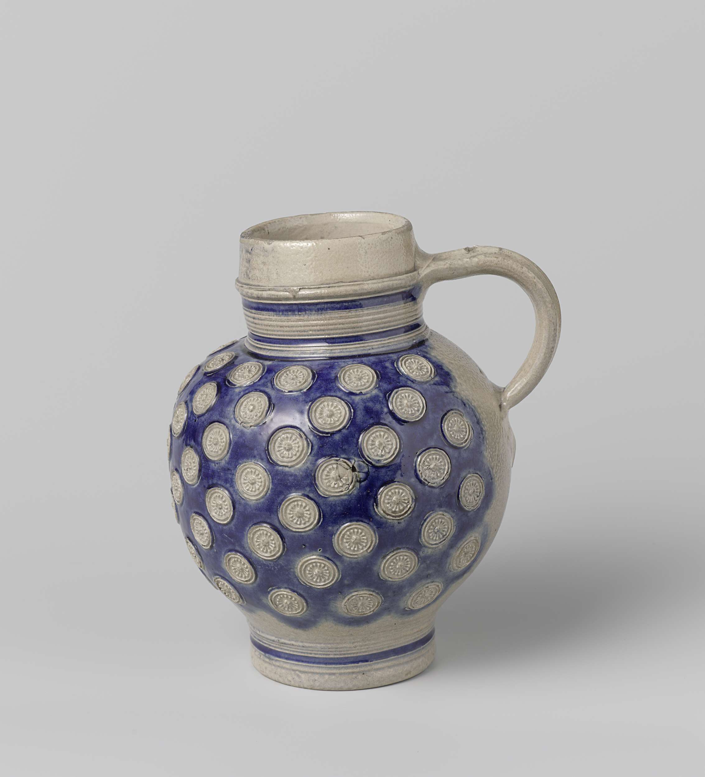 Ceramic jug with intricate medallions, Unknown Artist