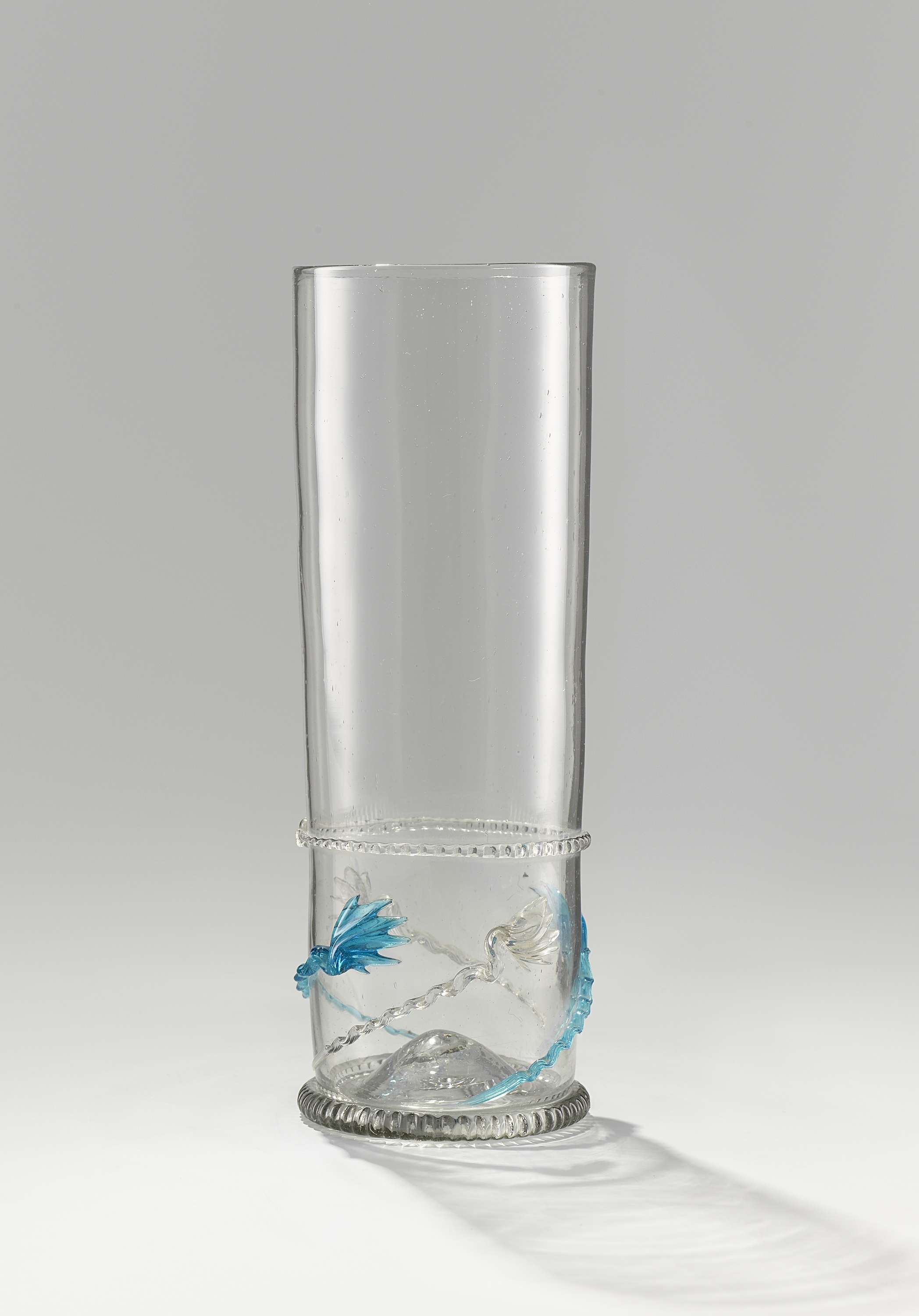 Glass comet beaker by Unknown Artist, featuring swirling patterns and cobalt blue color.