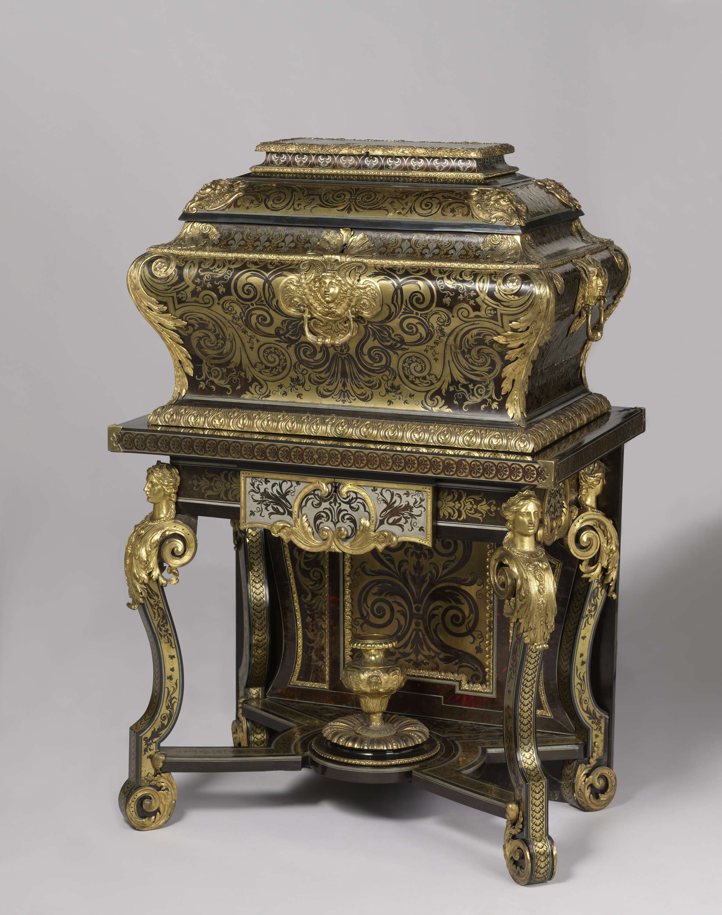 Two toilet caskets, by André-Charles Boulle, public domain