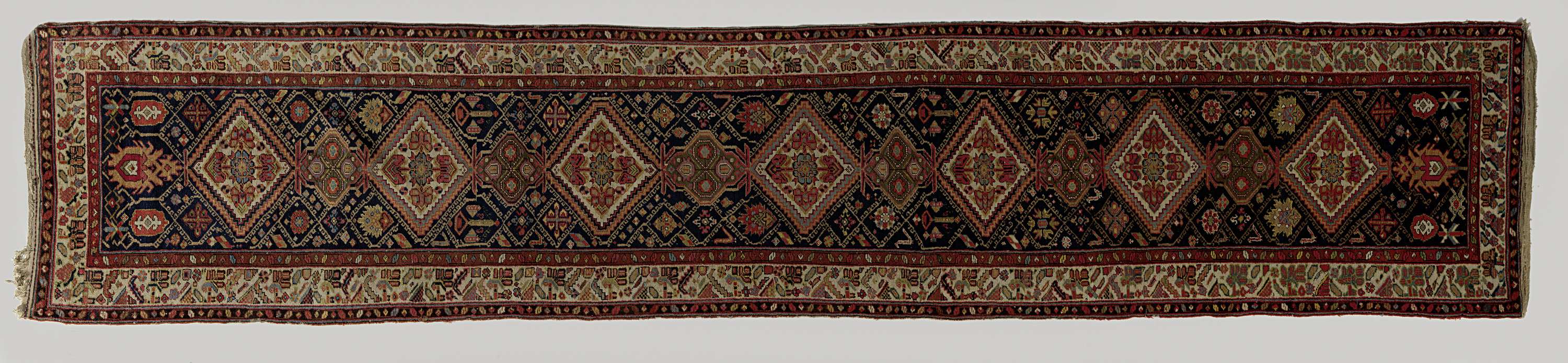 Victorian tapestry titled Oosters tapijt, made of wool, featuring intricate floral designs.