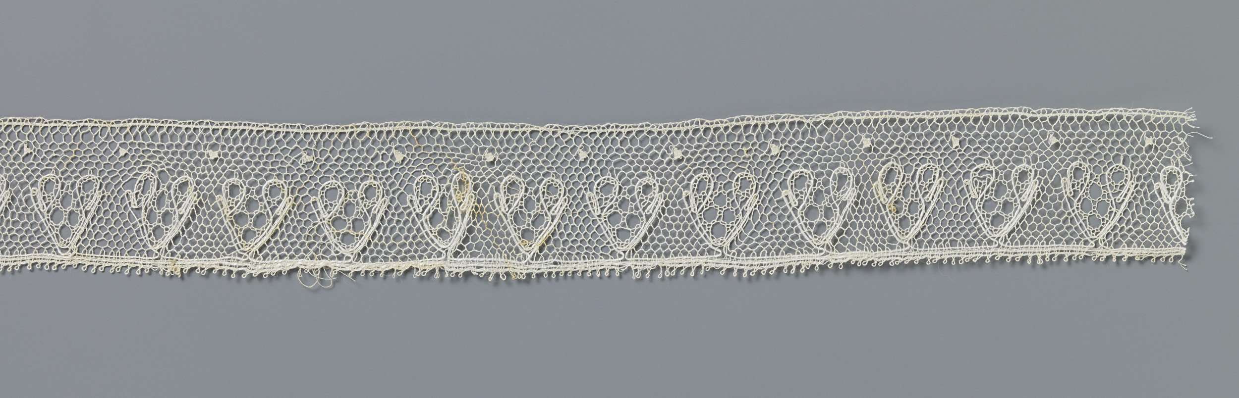 Lace work featuring heart motifs and circle patterns by Unknown Artist