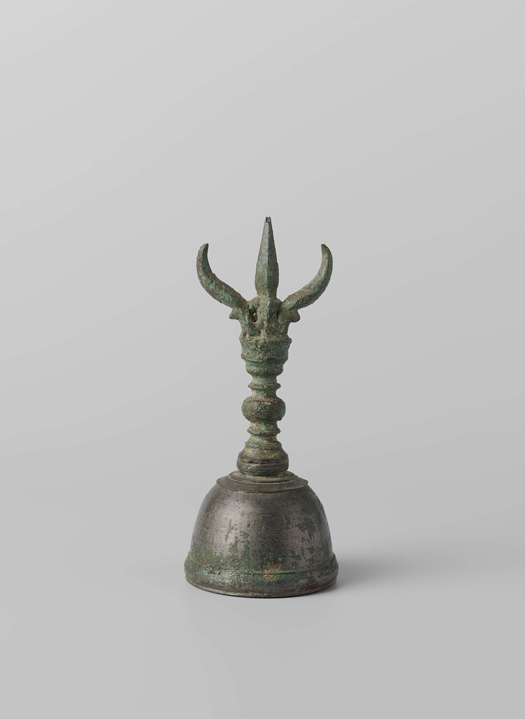 Bronze handbell with intricate engravings by an unknown artist