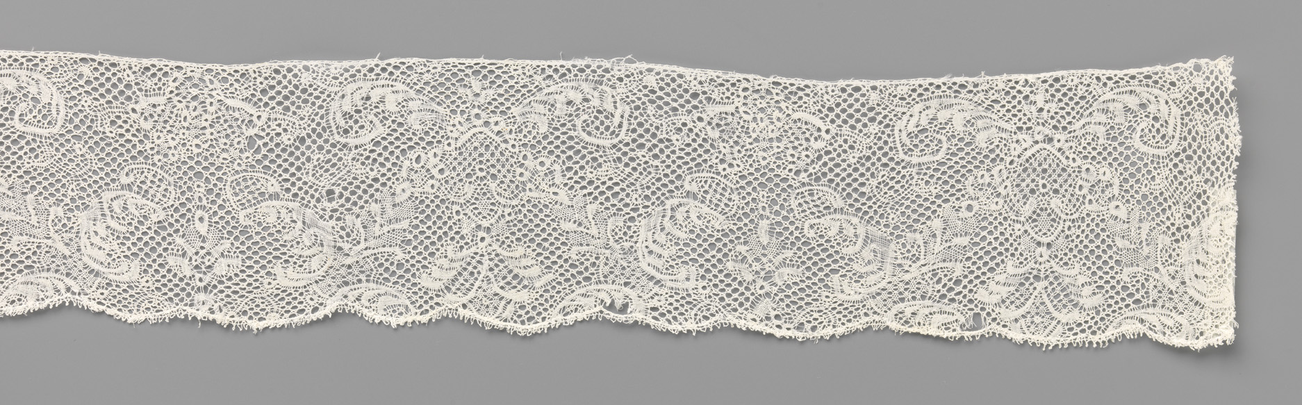 Lace work featuring two triangular shapes by Unknown Artist