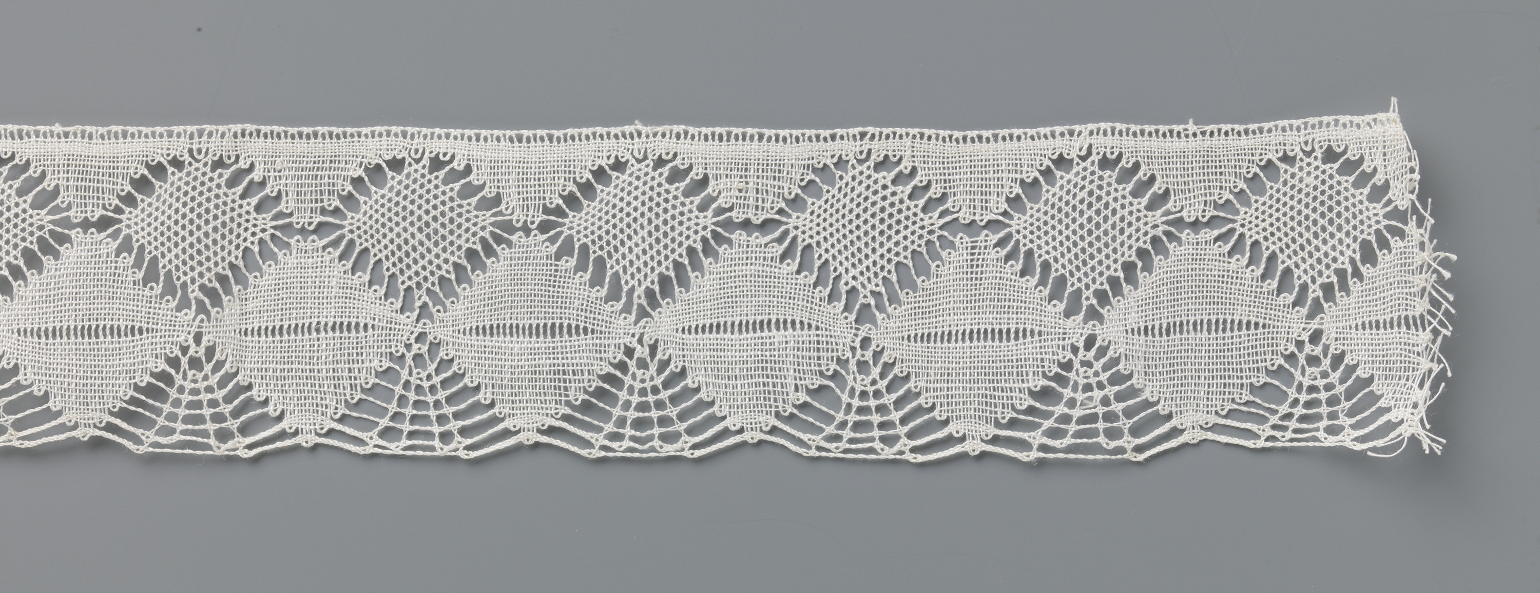 Lace artwork by Wilhelmina Cornelia Schutten-Putters, featuring intricate designs.
