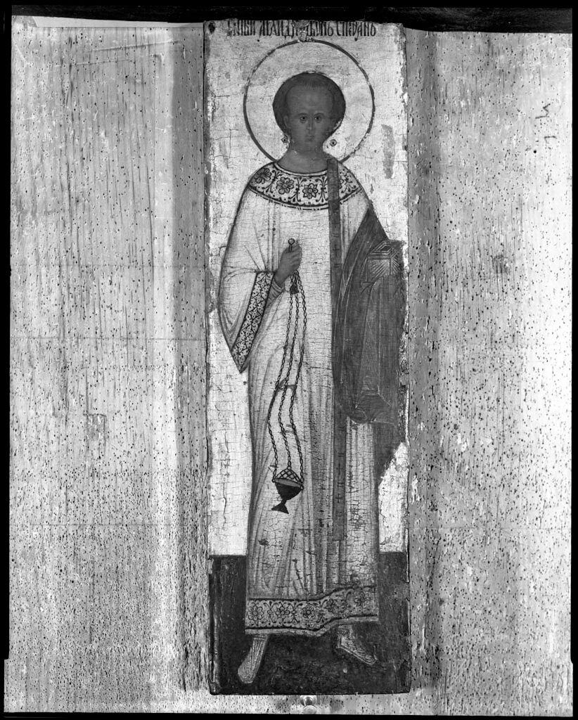 Saint Stephen, a religious tempera on panel by an unidentified artist, illuminated by divine light.