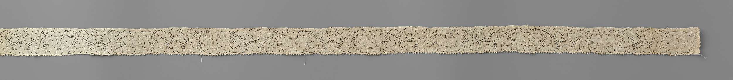 Lace artwork featuring a peony and leaves by Unknown Artist