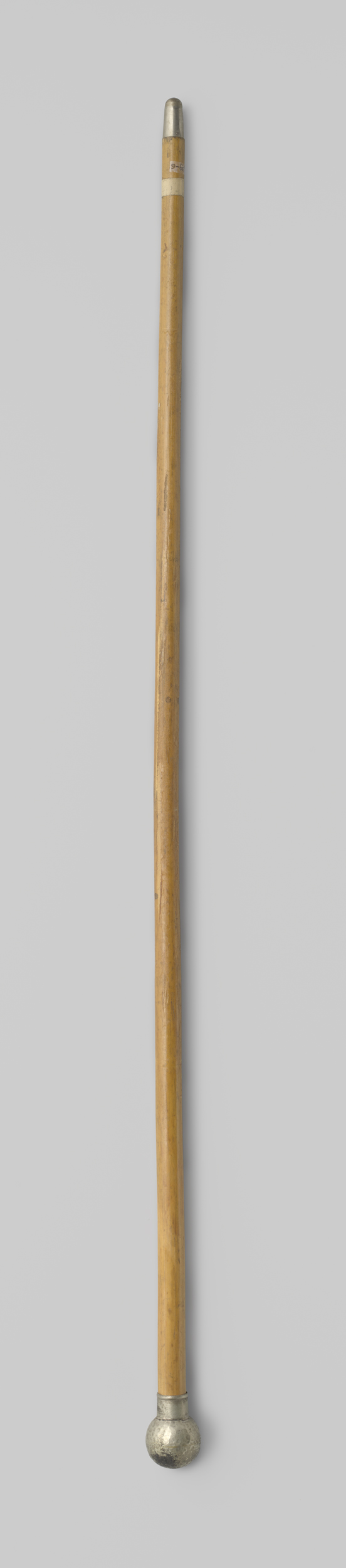 Silver decorative art piece by Gustav Schnitzler featuring a parasol handle with alpaca ball.