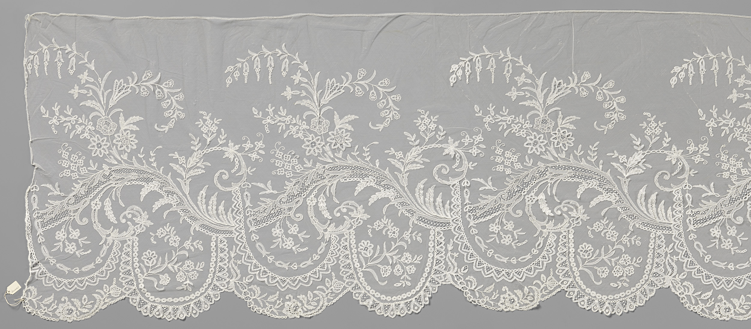 Lace decorative art featuring floral motifs by Unknown Artist