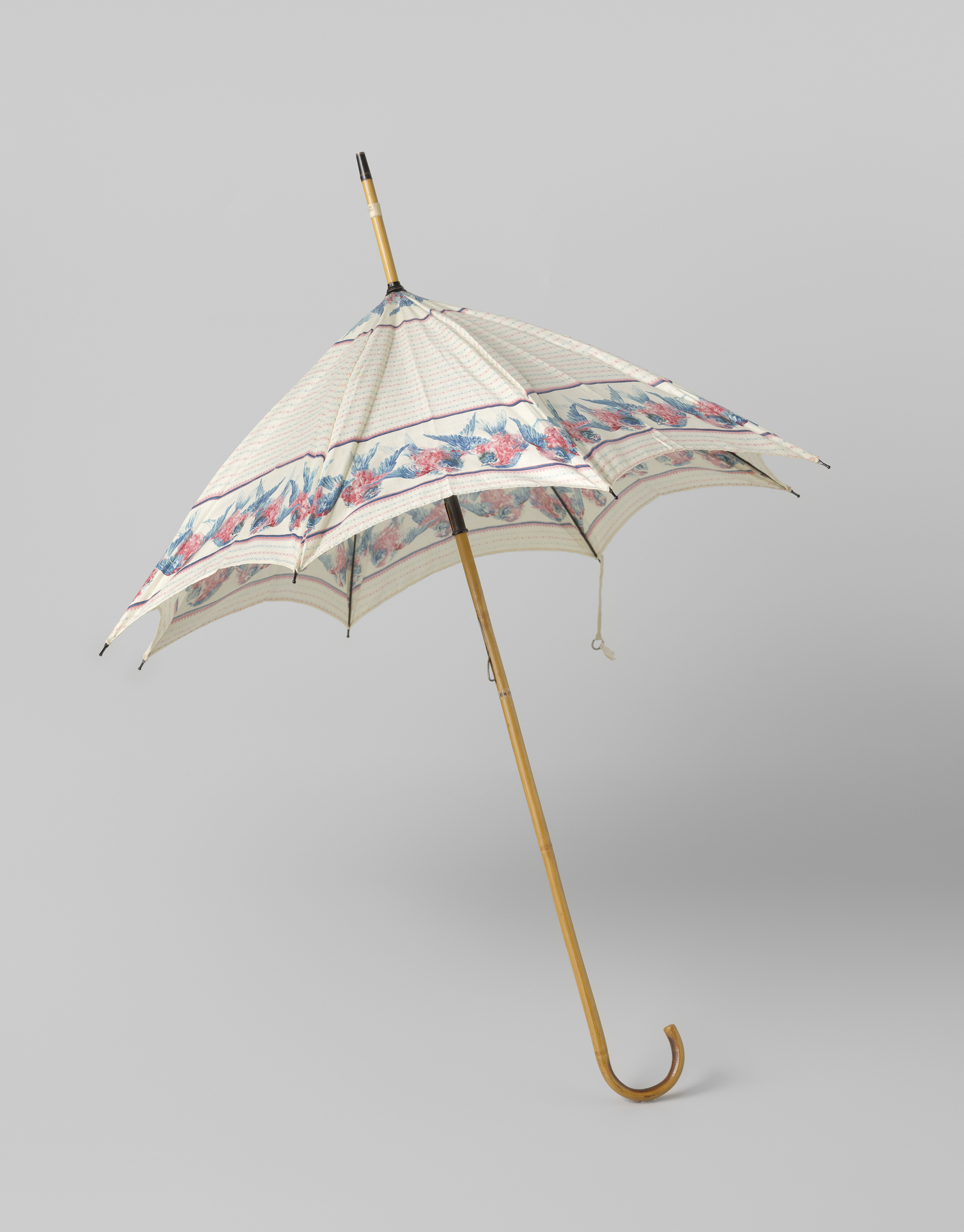 Parasol with pink and blue birds on cotton by Gustav Schnitzler
