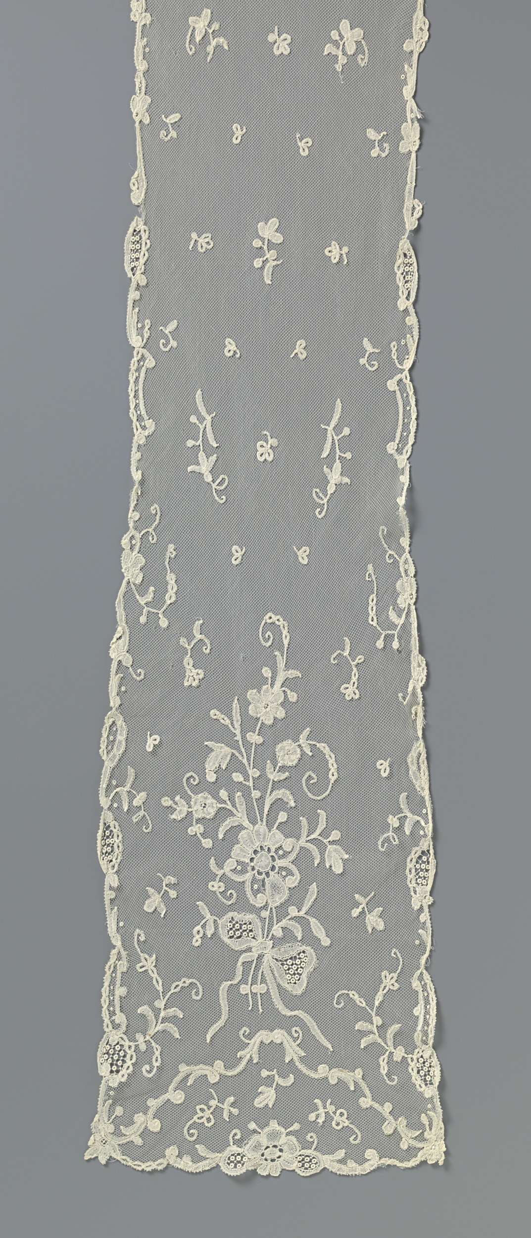 Lace decorative art featuring a bow by Unknown Artist