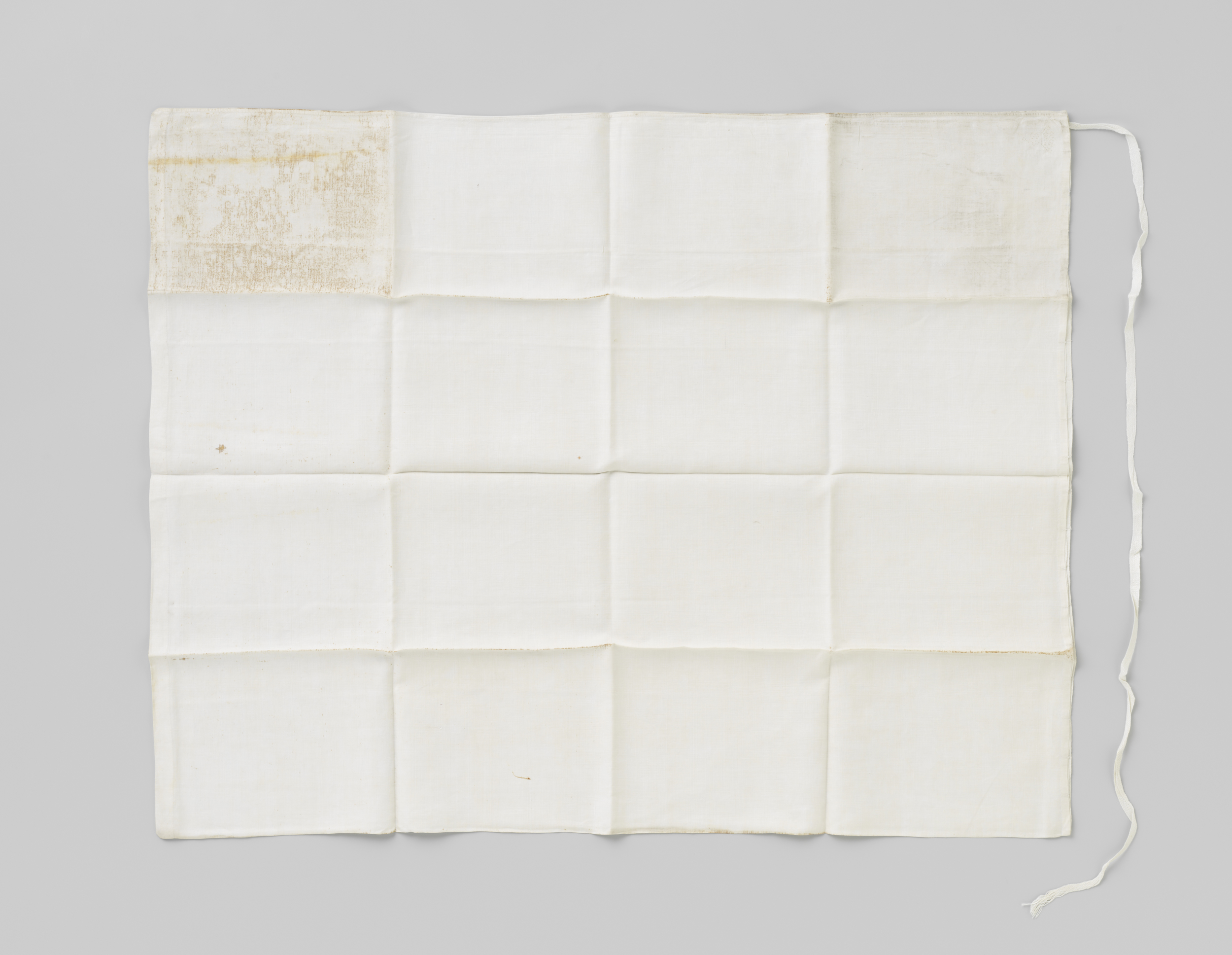 Linen textile Kussensloop by an unknown artist featuring intricate patterns and warm colors.