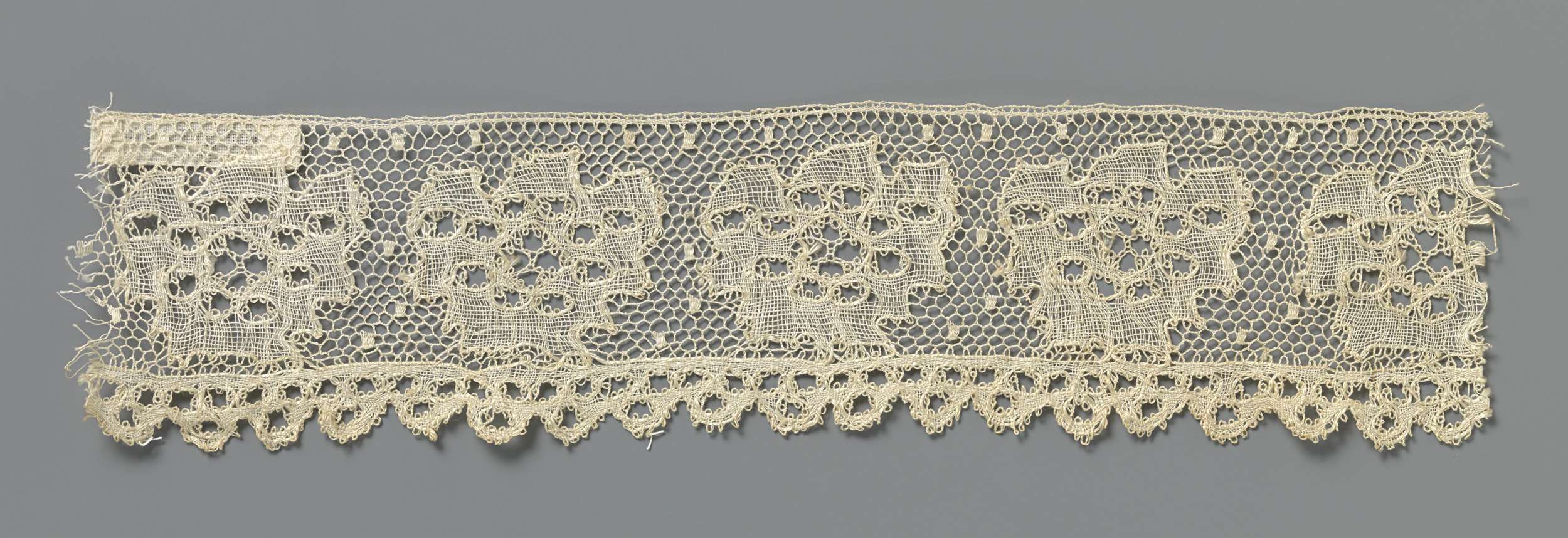 Lace artwork featuring whimsical flowers by Unknown Artist