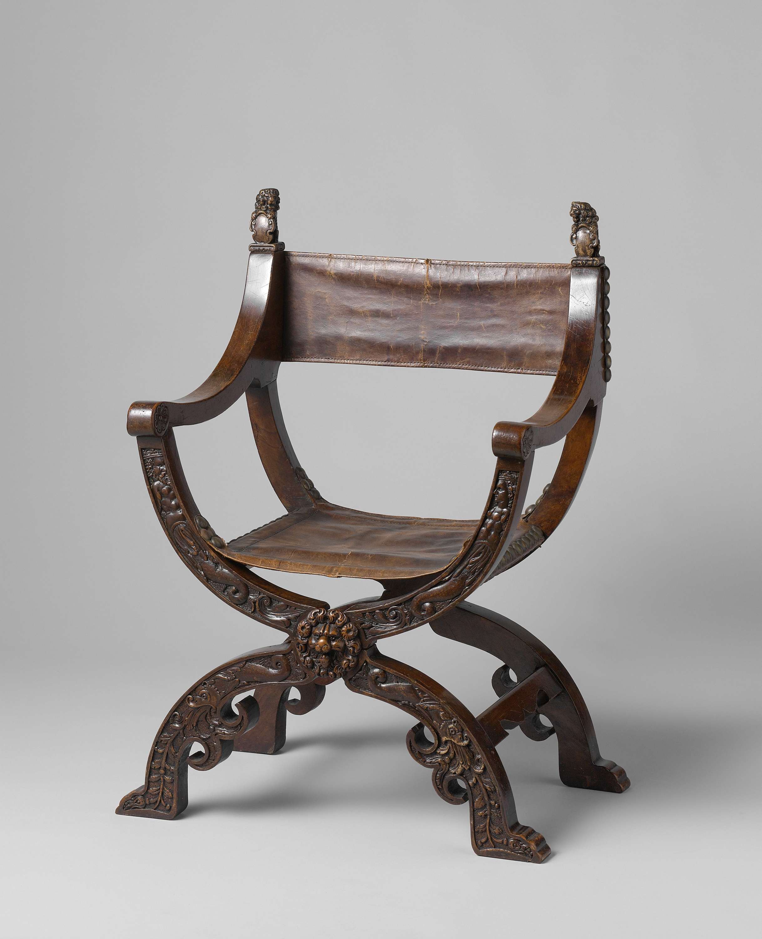 Folding X-chair, by Unknown Artist, public domain