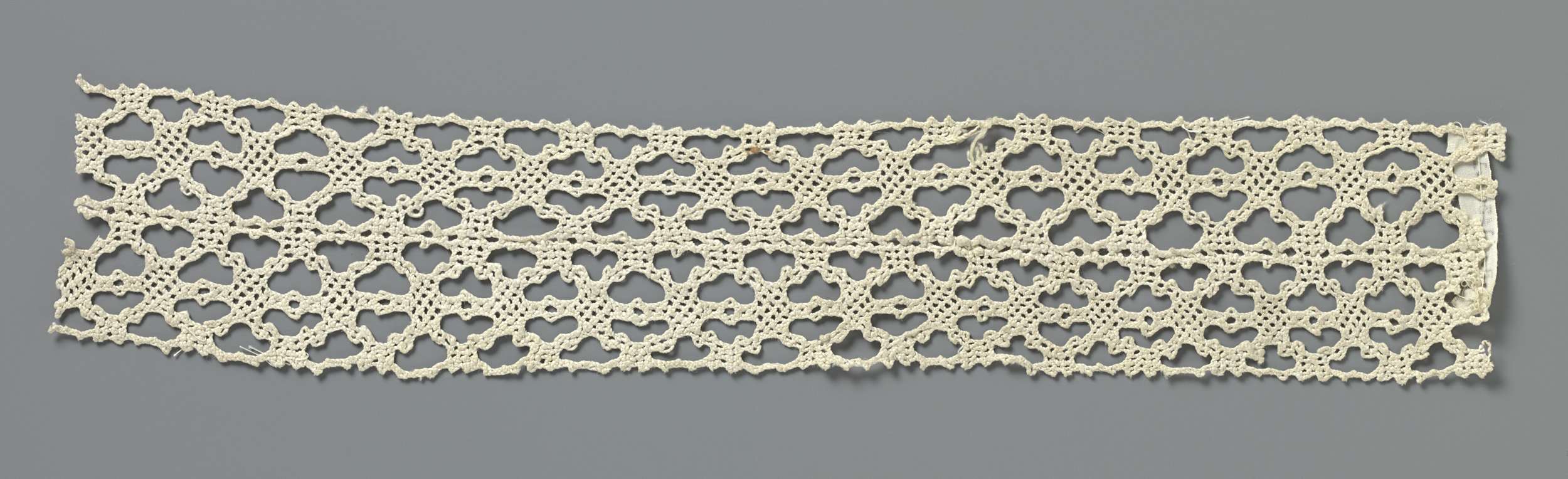 Lace work featuring hexagons by Unknown Artist