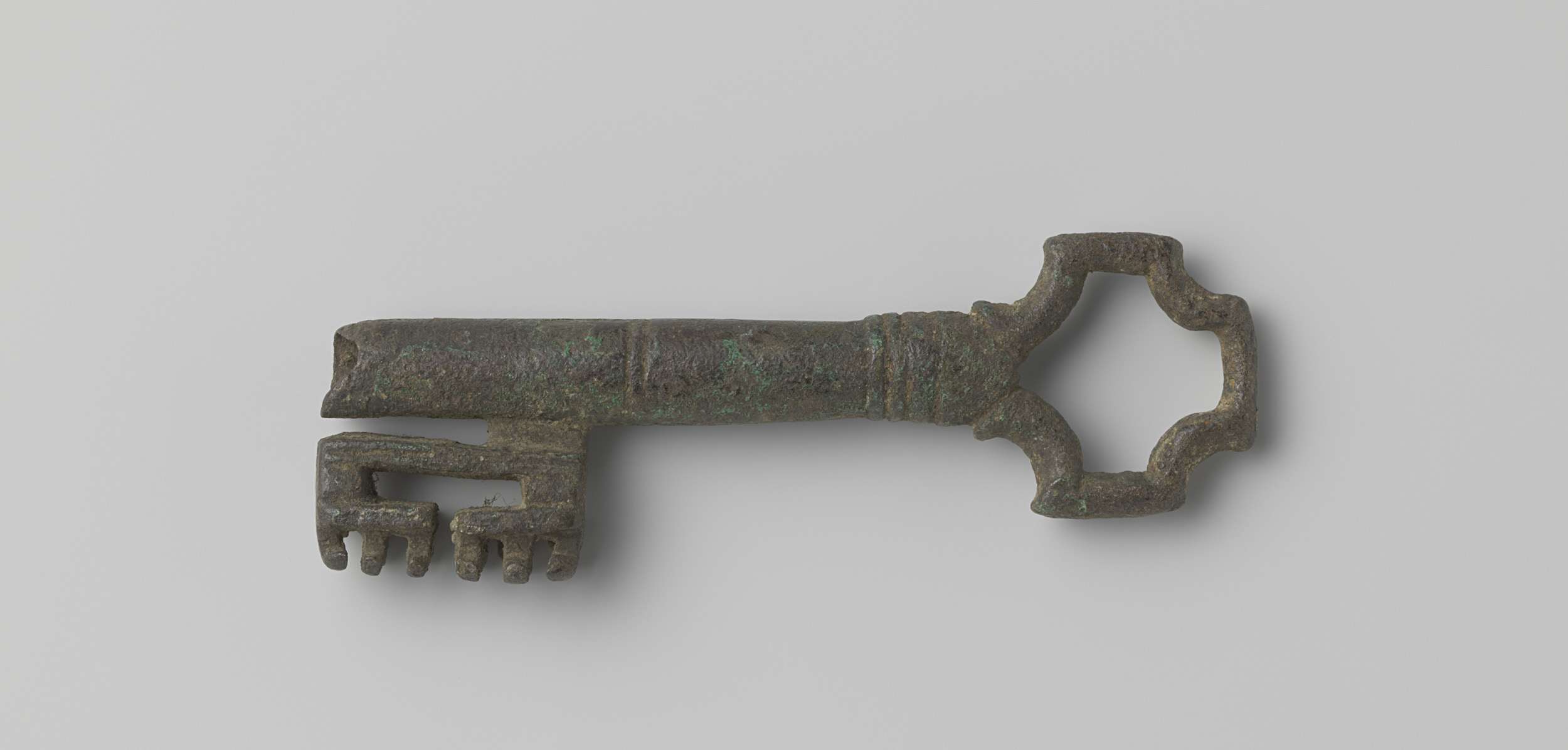 Gothic engraving featuring a pipe key with intricate carvings