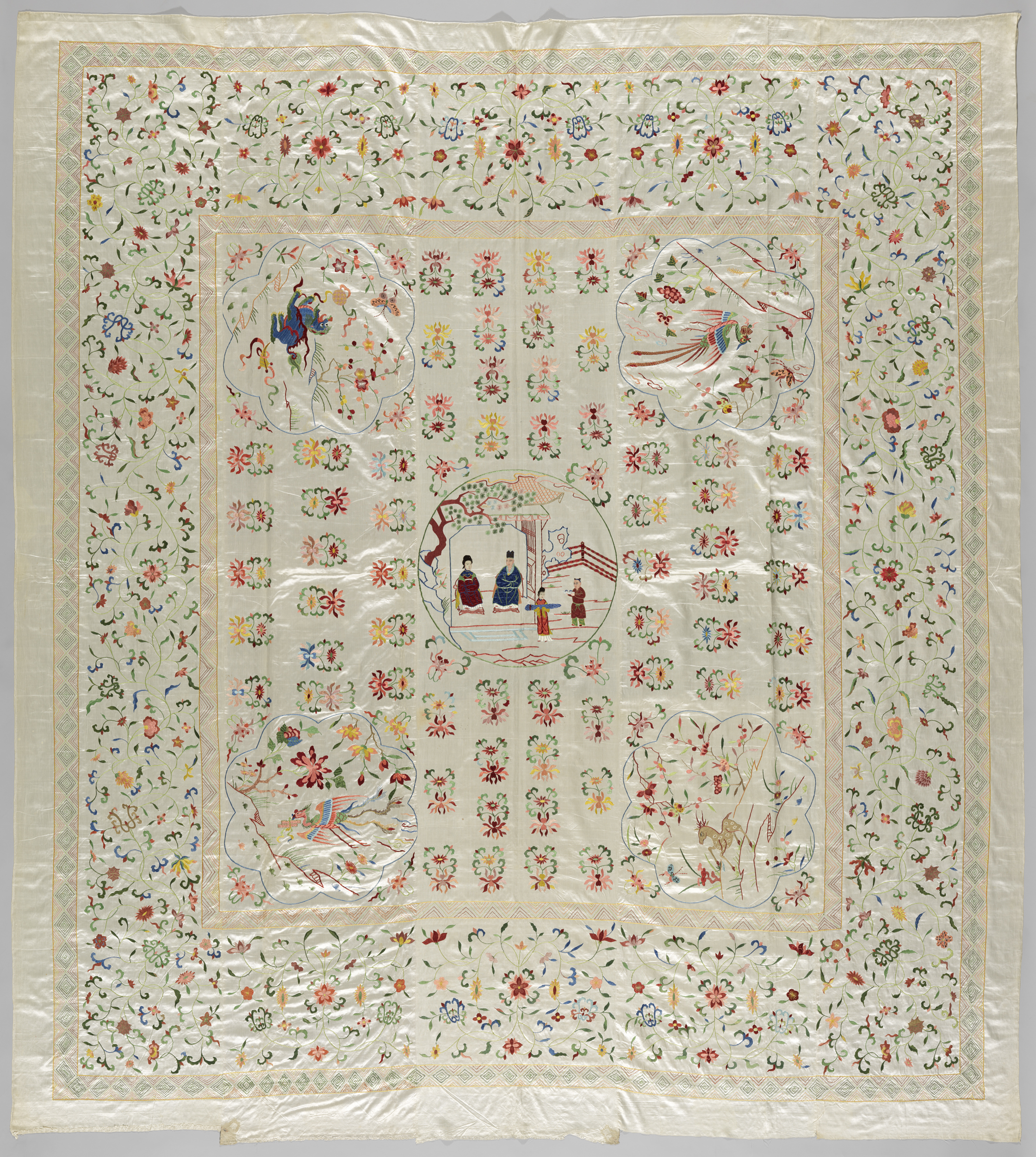 Genre scene depicting a family gathering, textile medium, artist unknown