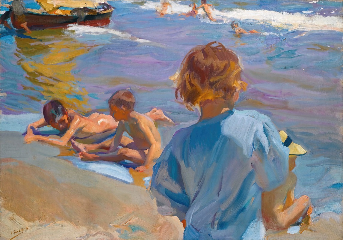 Children play on a sunny beach in Valencia, capturing the joy of childhood.