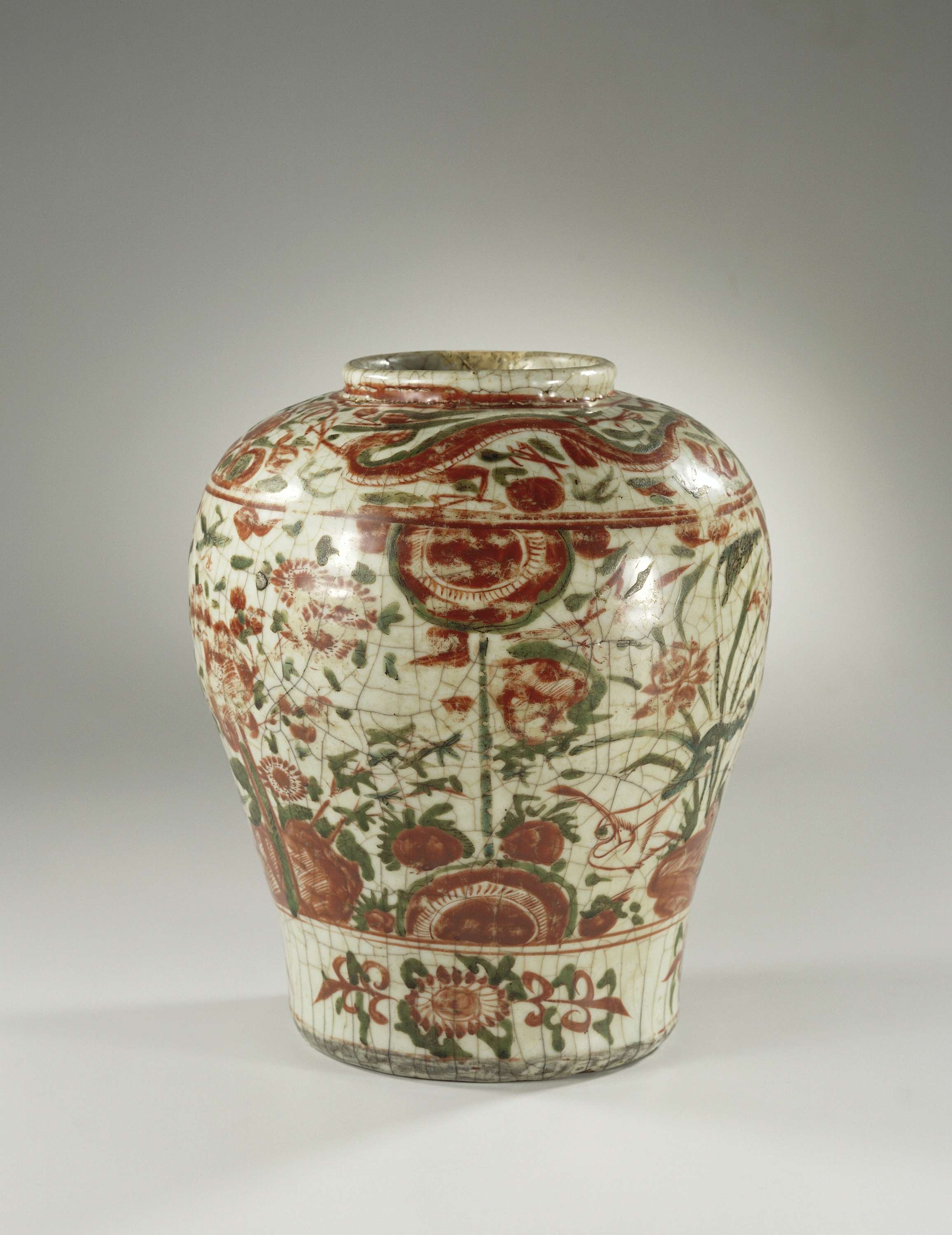 Decorative stoneware jar with dragon and floral motifs by unknown artist