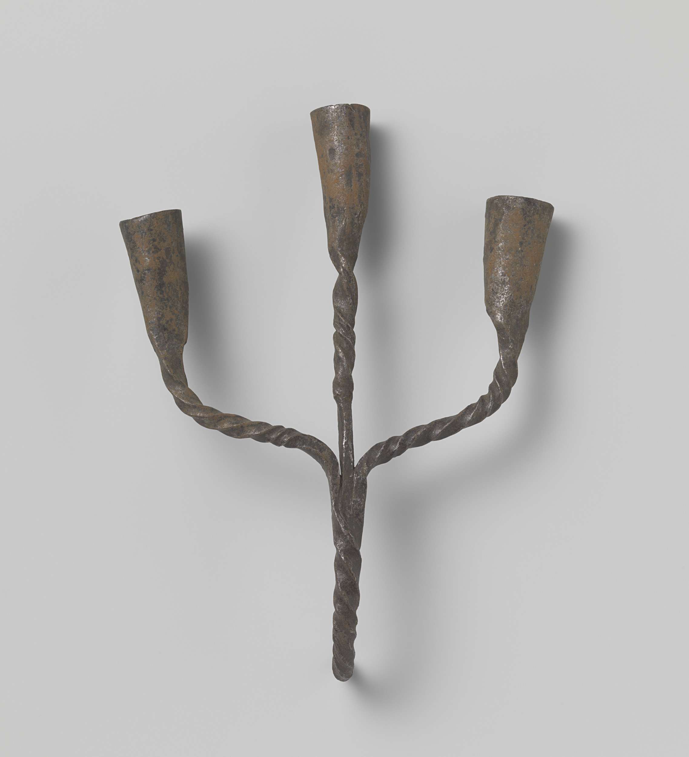 Three-armed bronze candelabrum by Unknown Artist