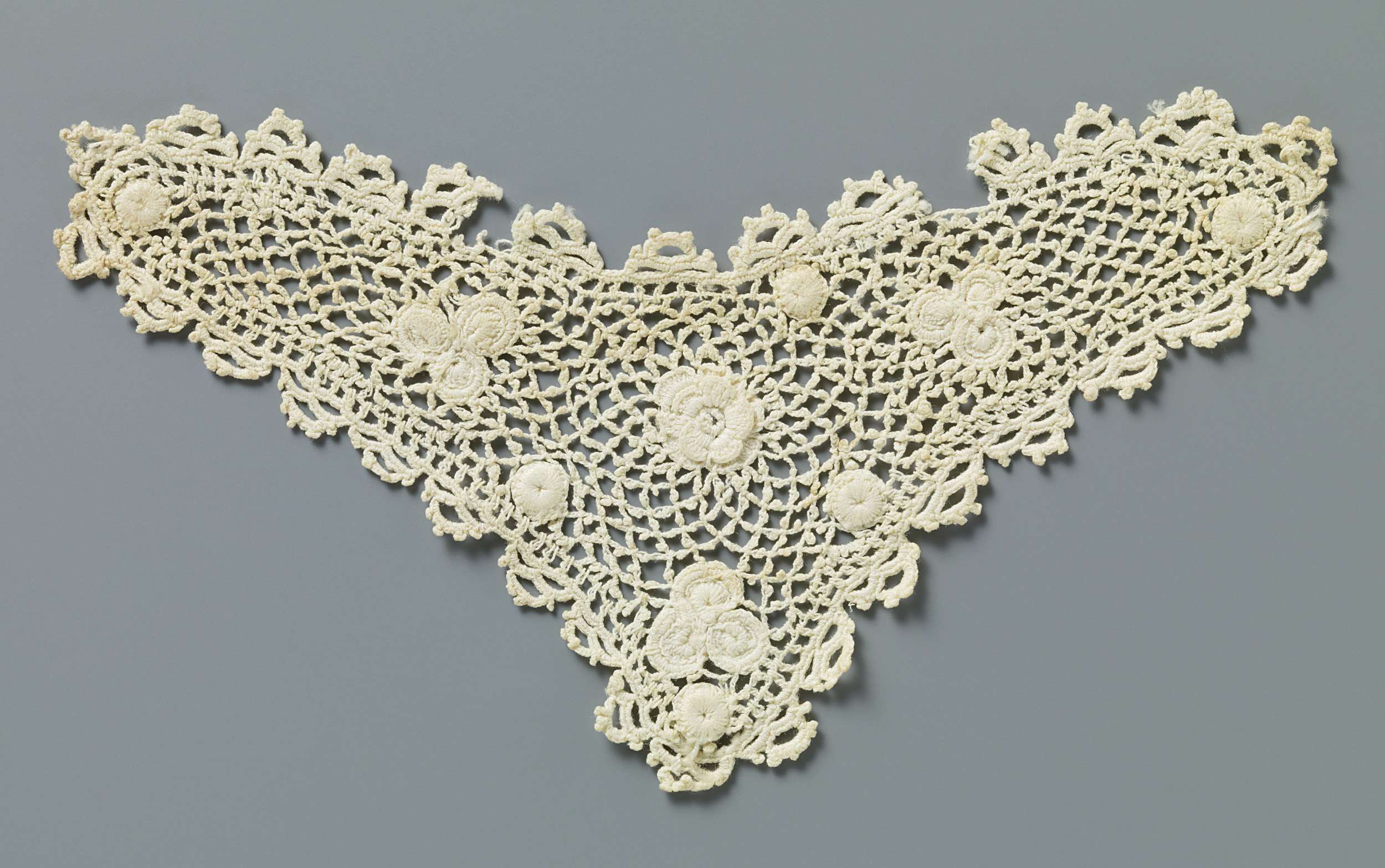 Lace textile featuring a rose and clover leaves by Unknown Artist
