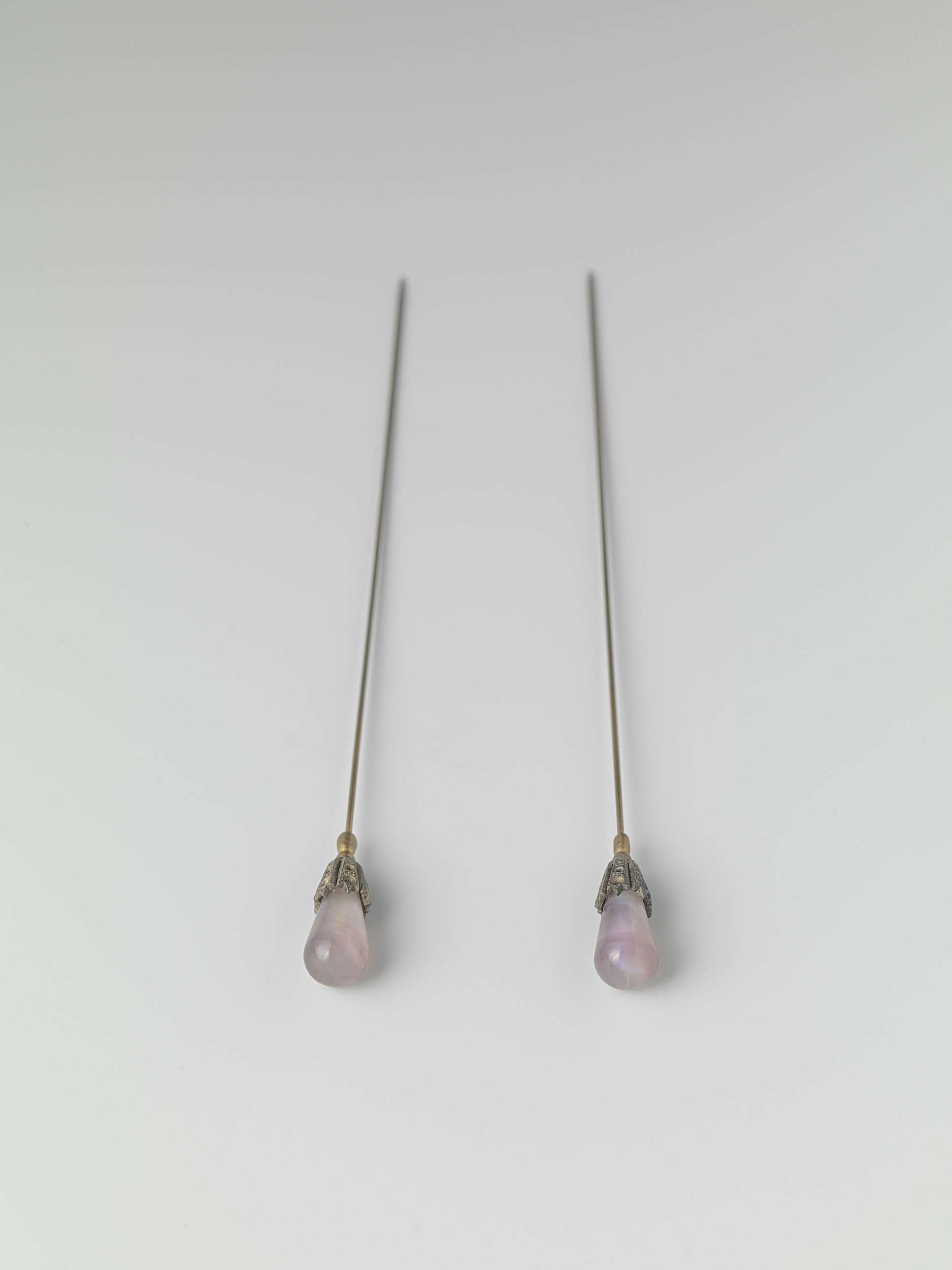 Metal hairpin with purple glass droplet by Unknown Artist