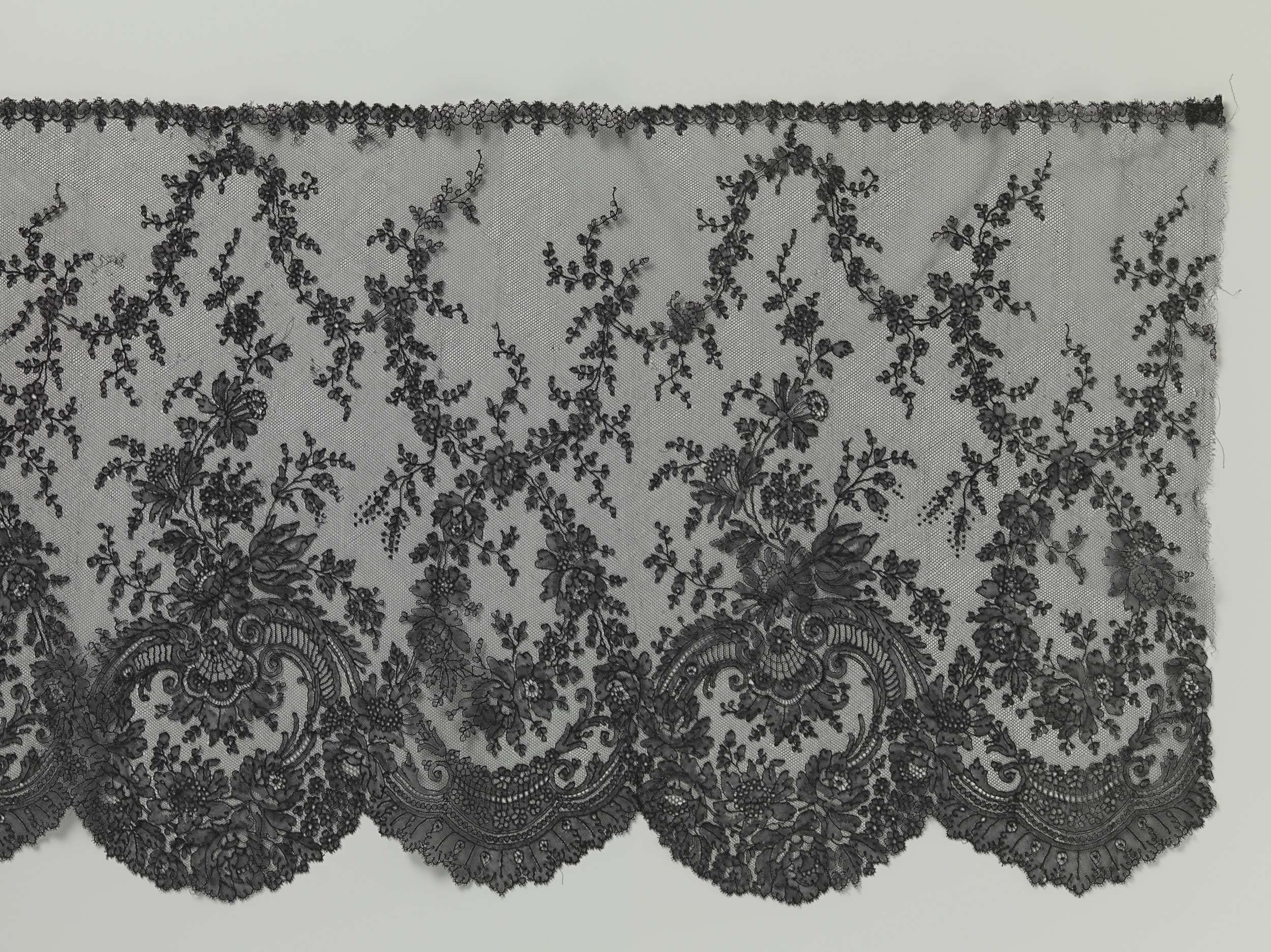 Intricate lacework featuring s-voluten by Unknown Artist, medium lace.