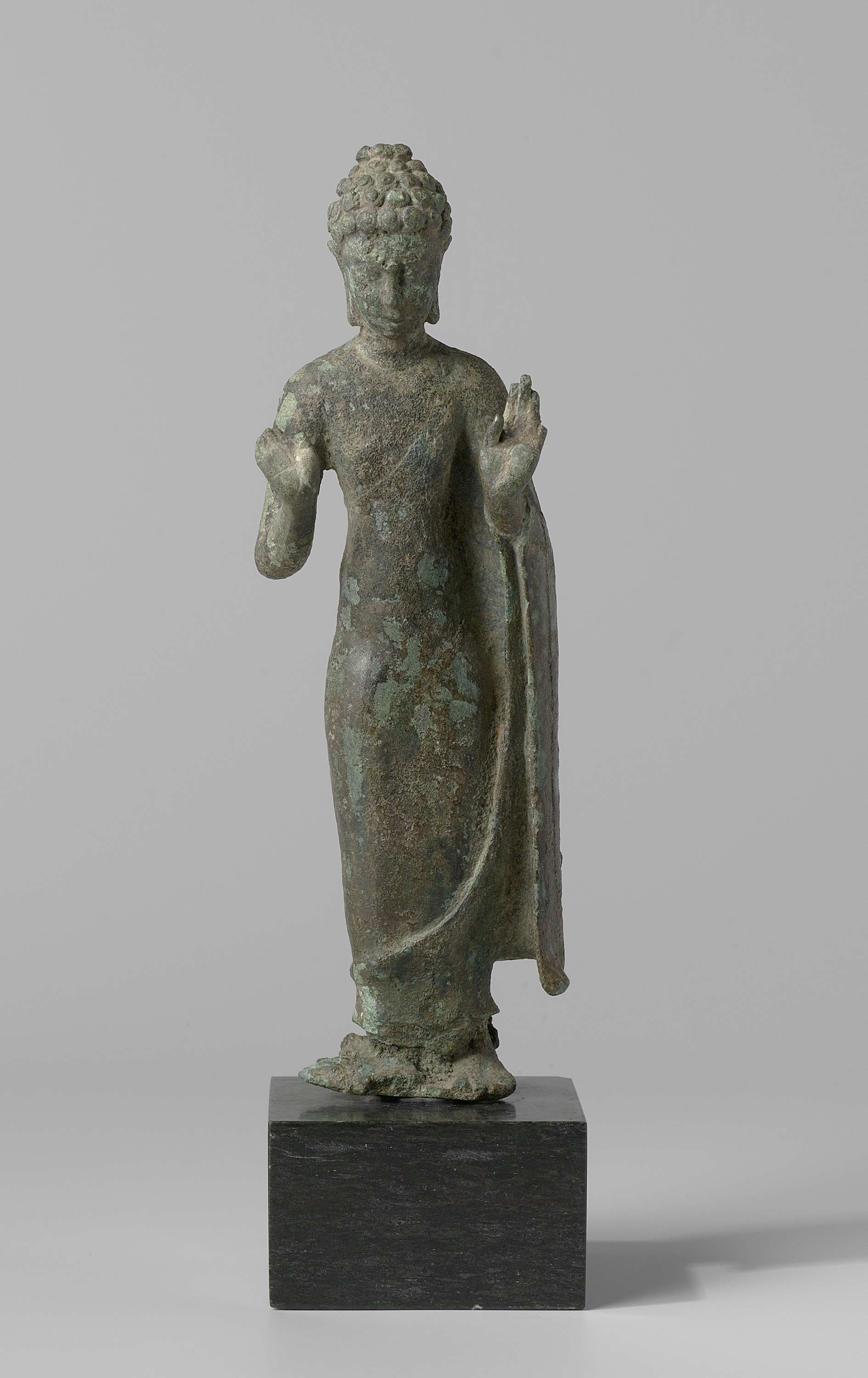 Buddha sculpture by an unknown artist, stone medium, depicting tranquility and wisdom.