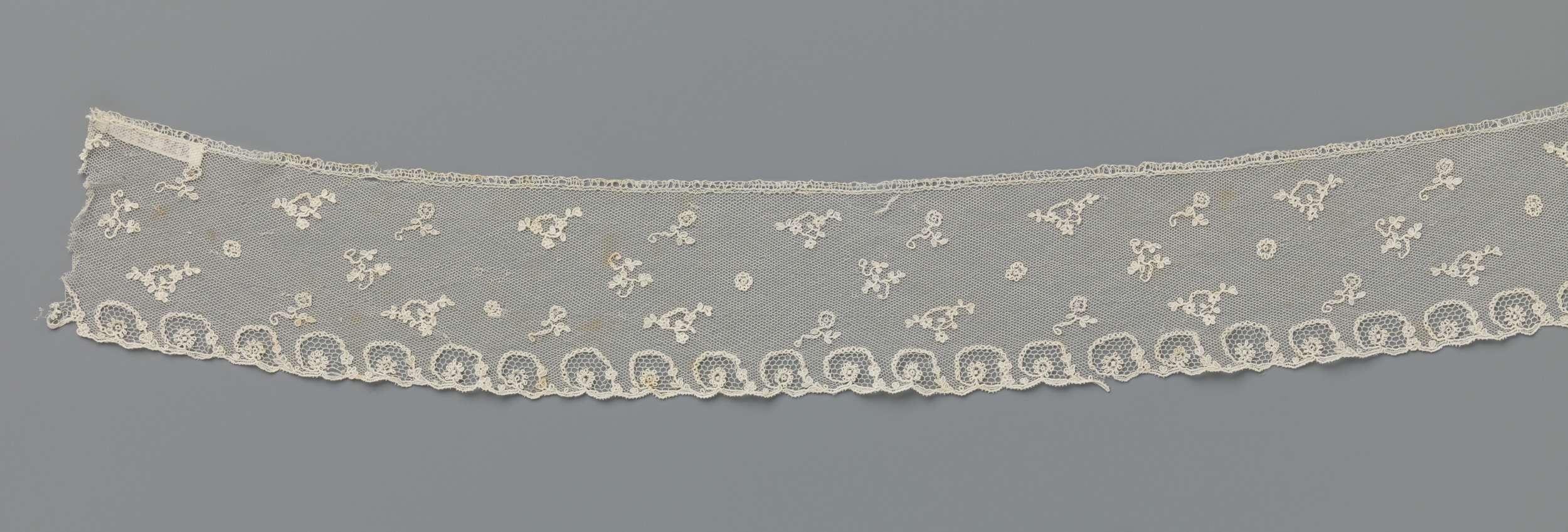 Lace artwork featuring rosettes and patterns by Unknown Artist