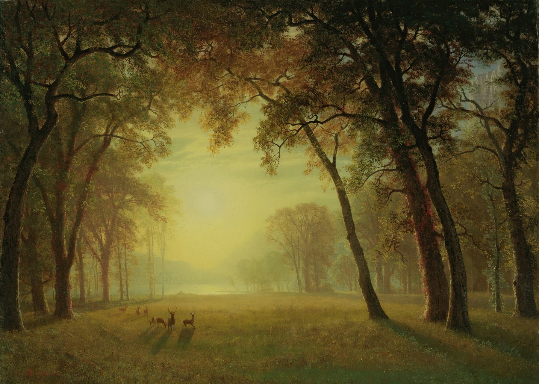 Oil painting of deer in a clearing surrounded by trees and mountains by Albert Bierstadt