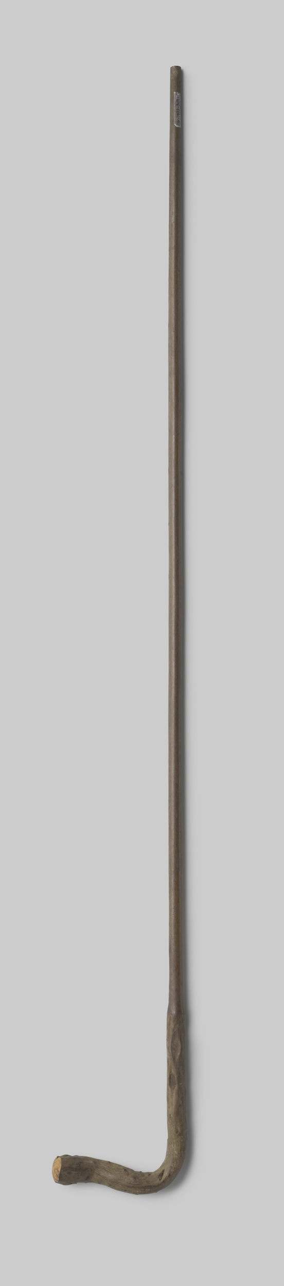 Decorative wooden umbrella handle by Gustav Schnitzler, crafted from birch and maple.