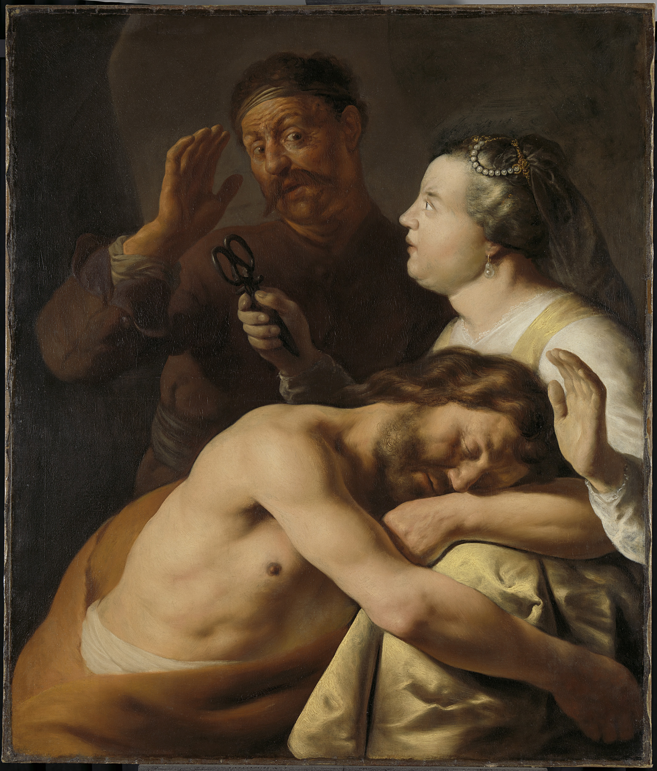 Samson and Delilah, oil on canvas by Jan Lievens, showing Delilah cutting Samson's hair.