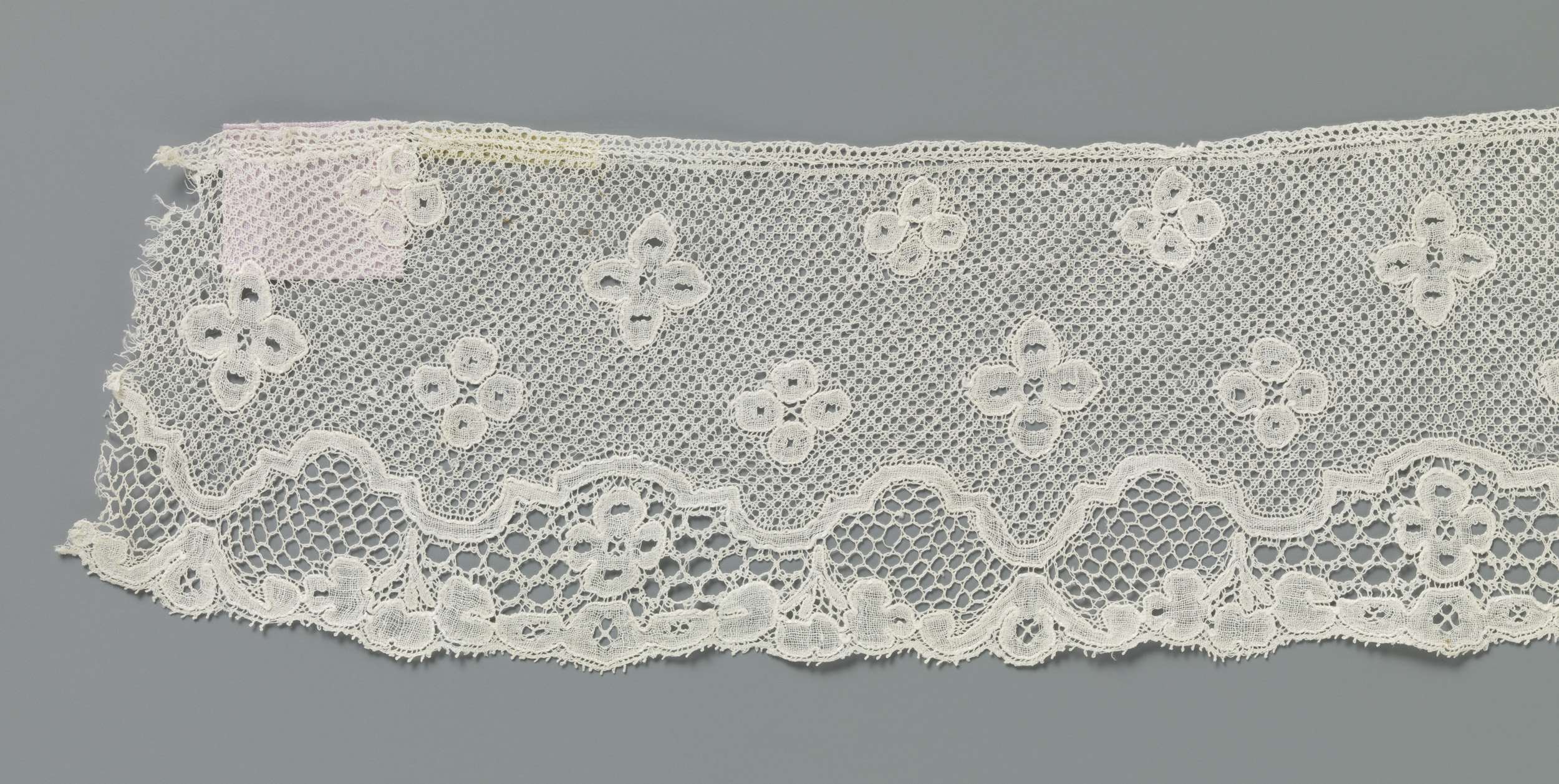 Lace textile with symmetrical patterns by Unknown Artist