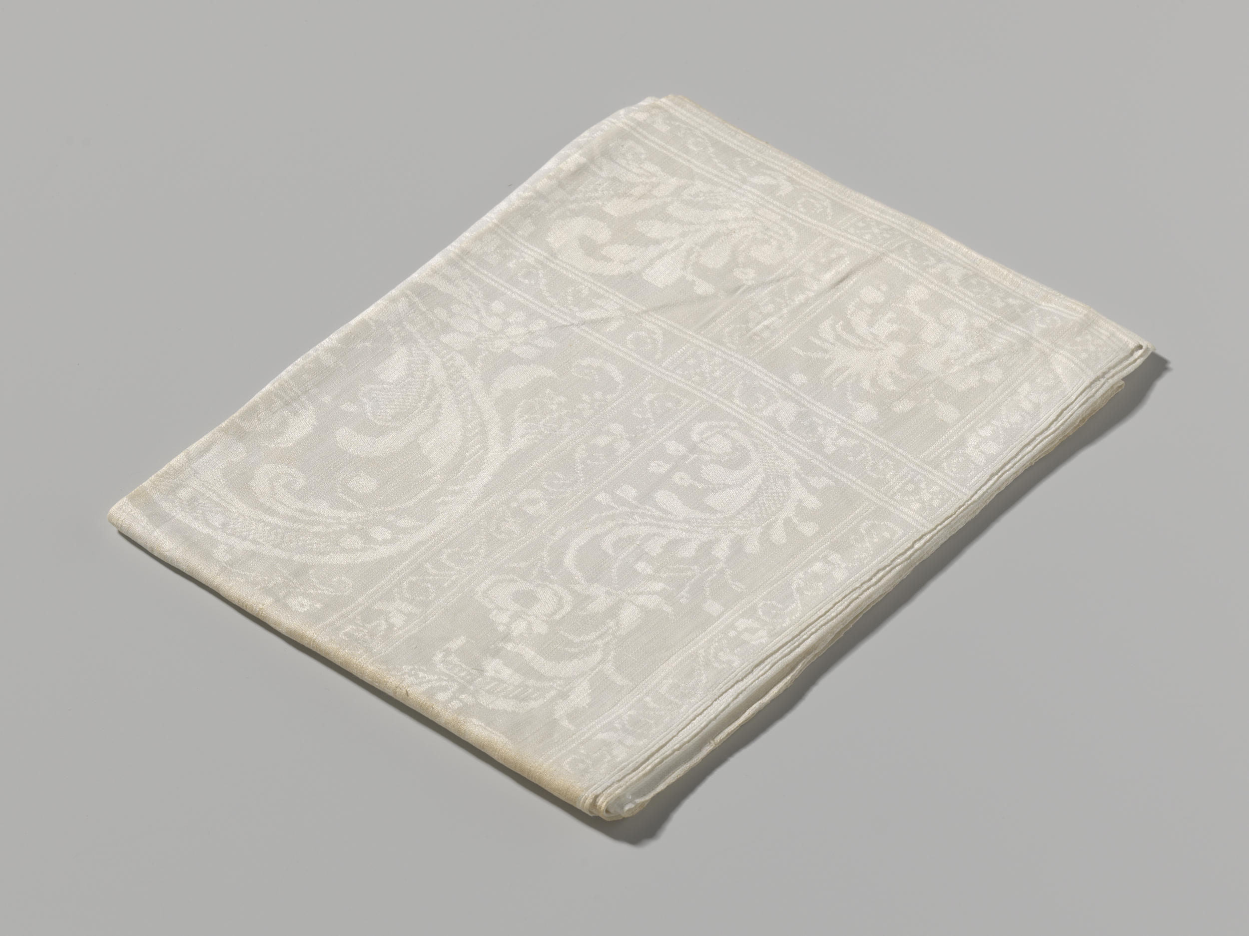 Decorative art featuring swirling volutes and rich colors by Unknown Artist