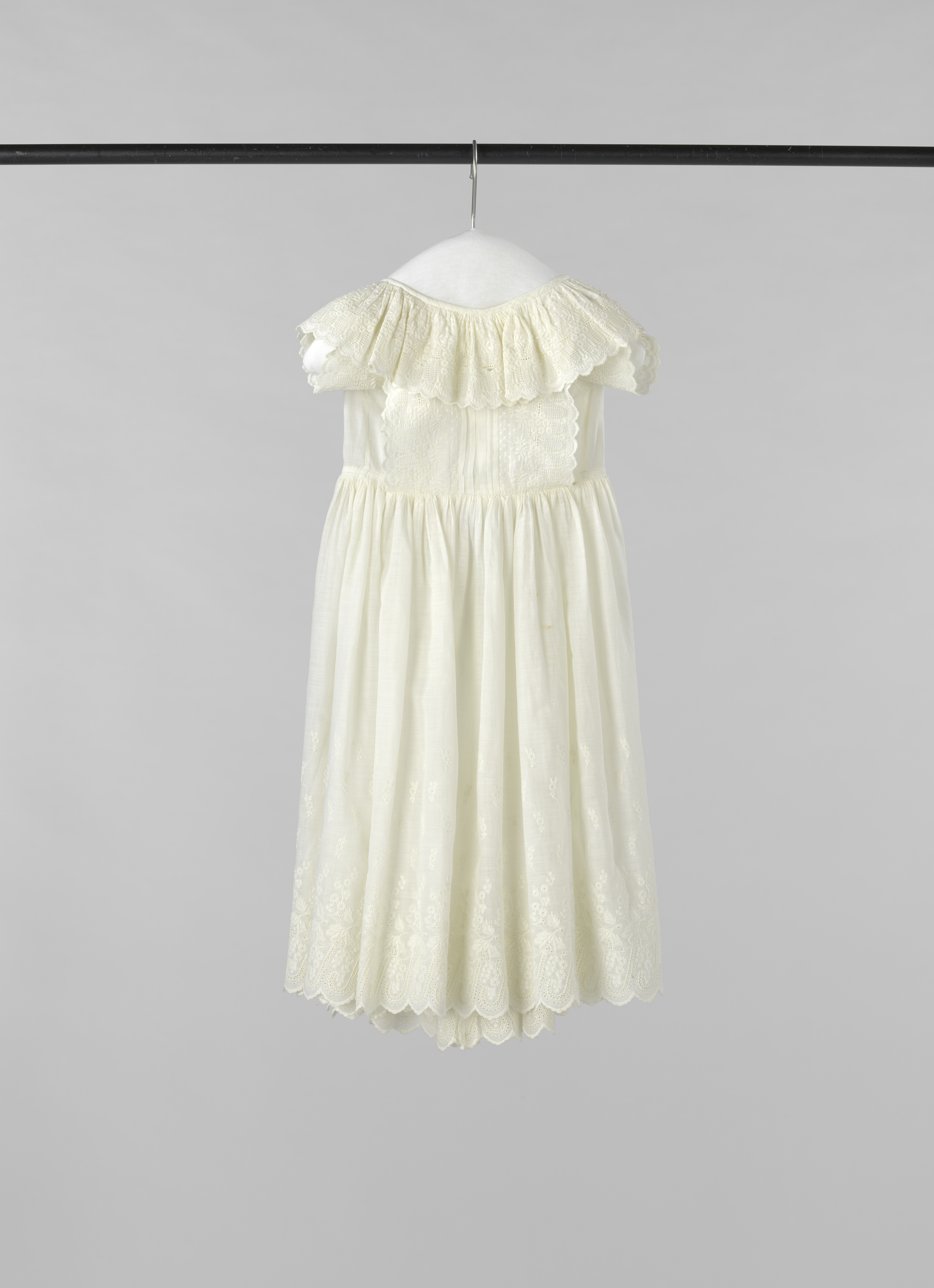 Victorian textile 'kleuterjurkje' by Unknown Artist, featuring embroidered cotton fabric.