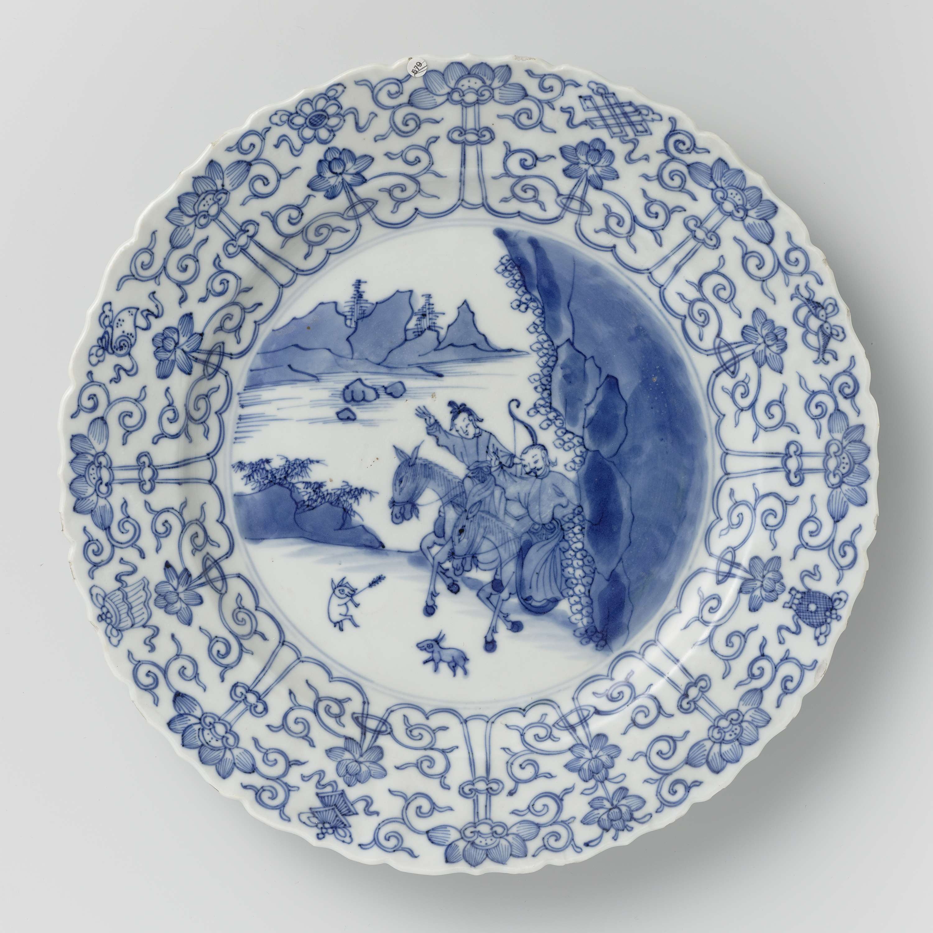 Saucer-dish with hunting scene, lotus scrolls, and auspicious symbols, porcelain by Unknown Artist