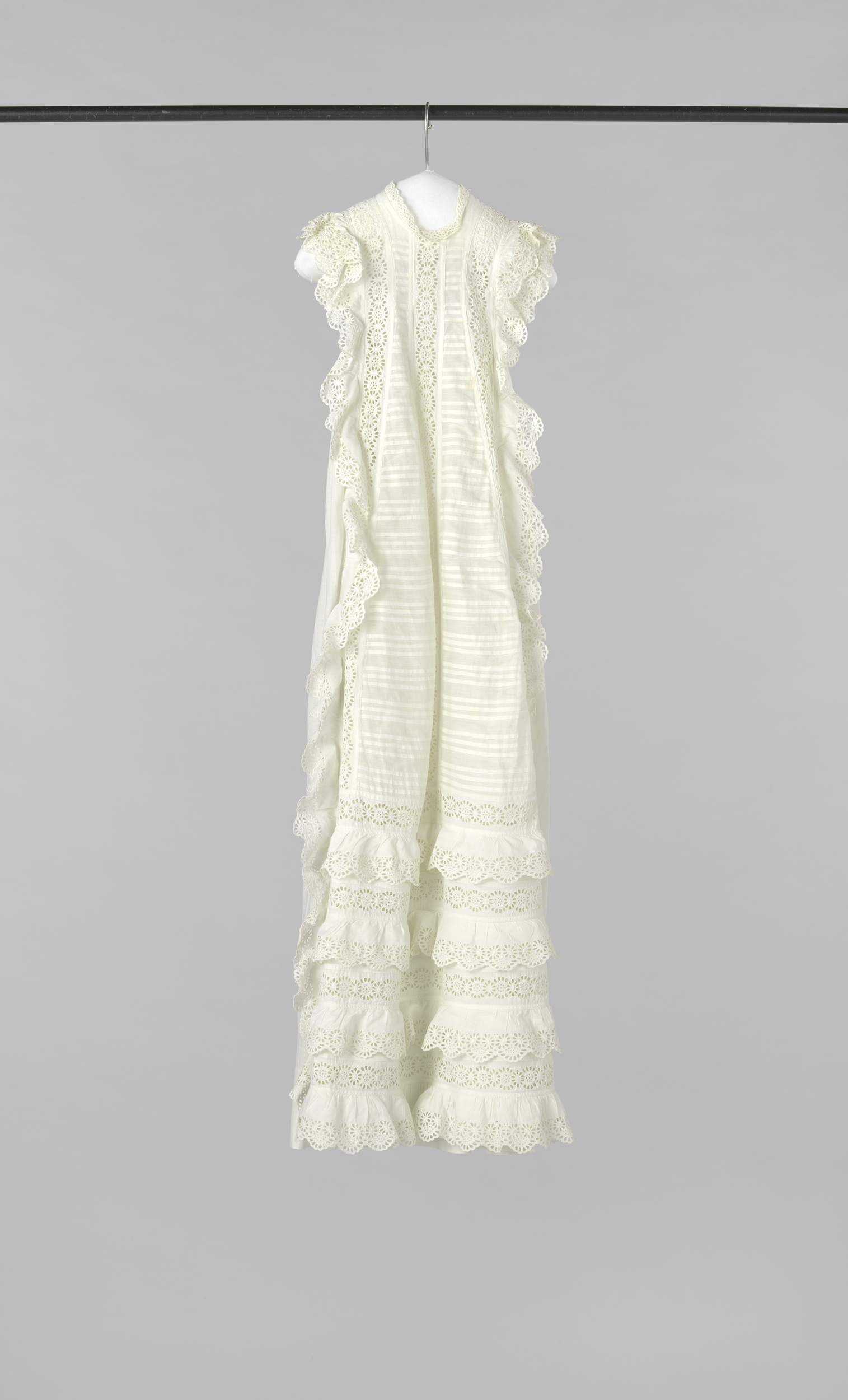 Victorian textile baby dress with intricate embroidery by Unknown Artist