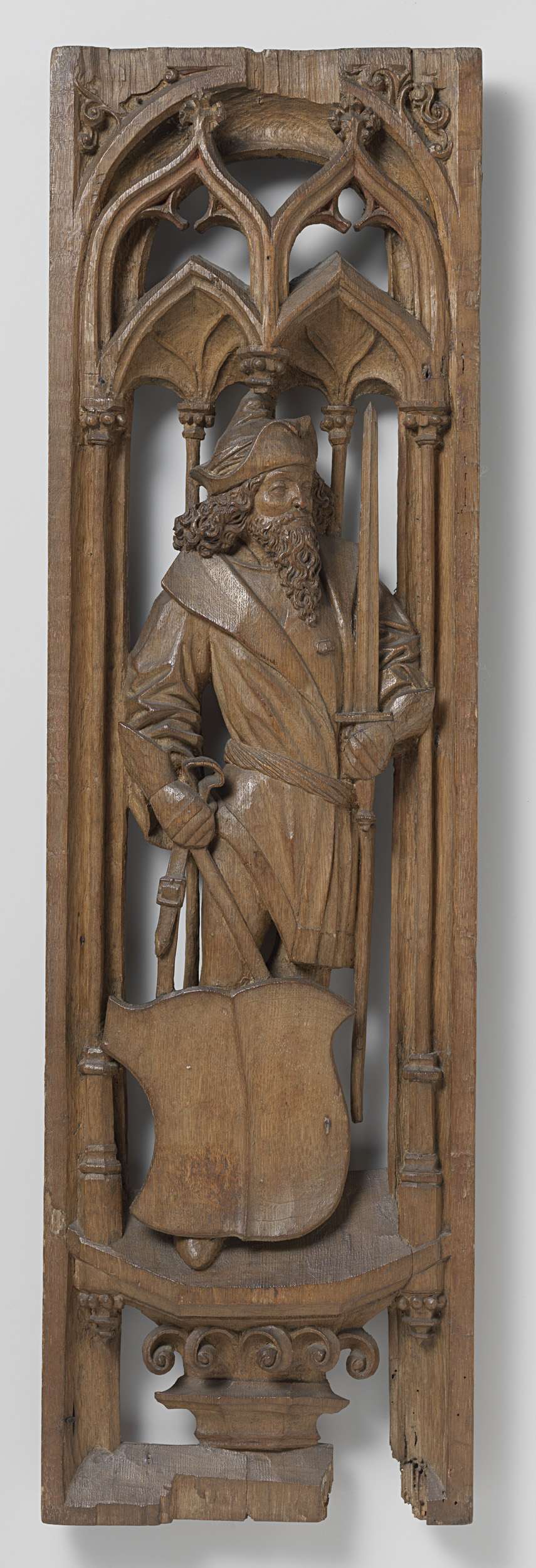 Panels from an organ case in oak by Jan Eerstensz van Schayck depicting figures with weapons