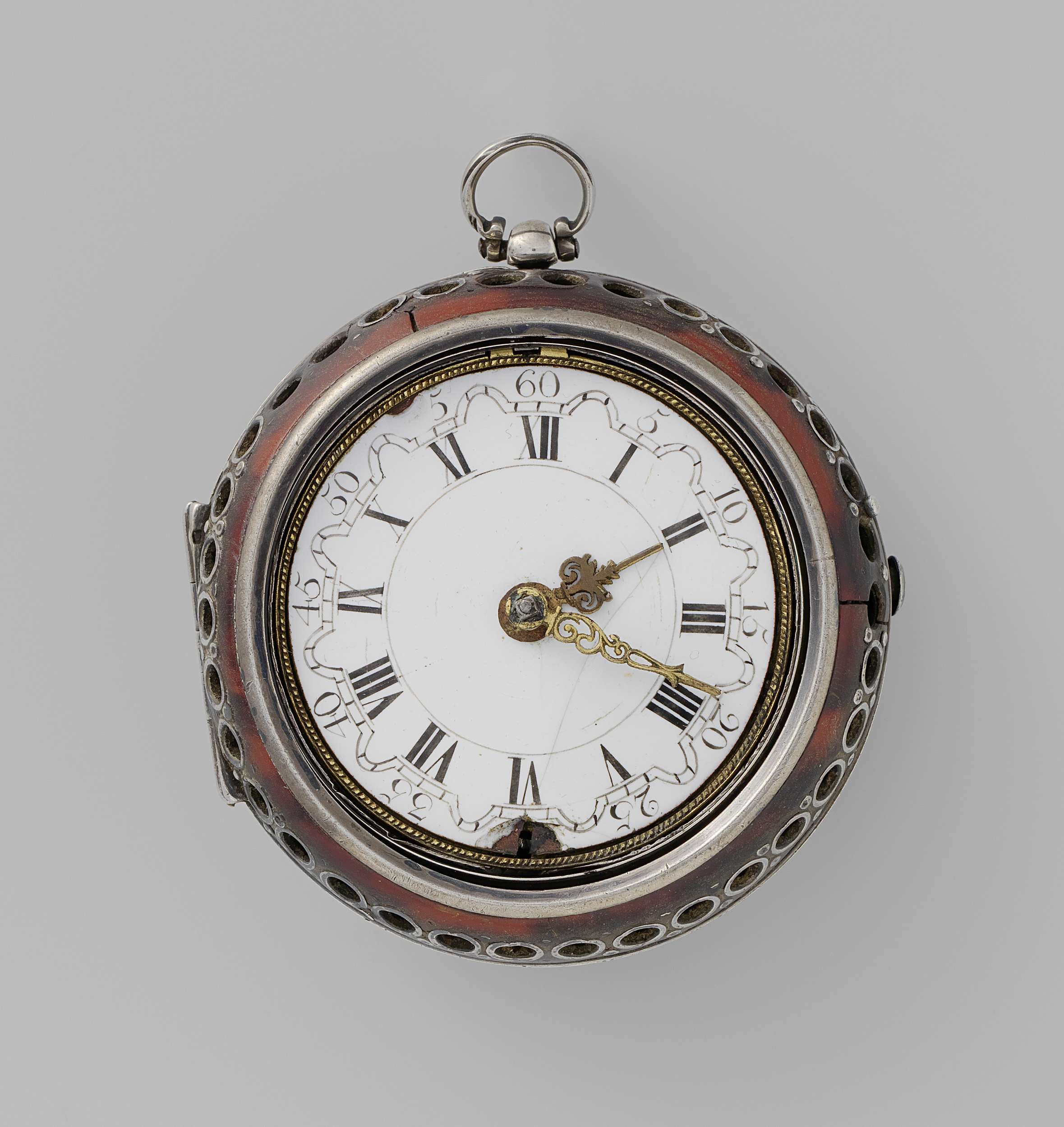 Still life of a metal watch by John Markwick, showcasing intricate gears and design.