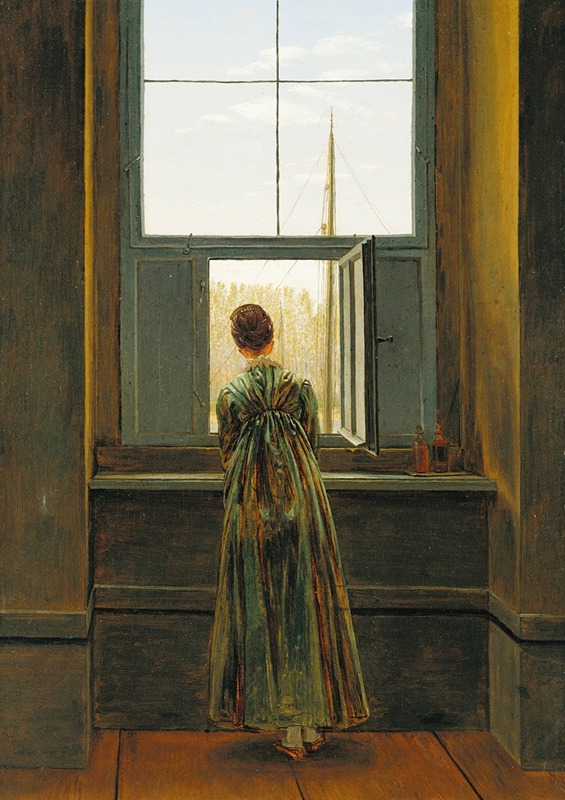 A woman gazes out a window in a contemplative pose.