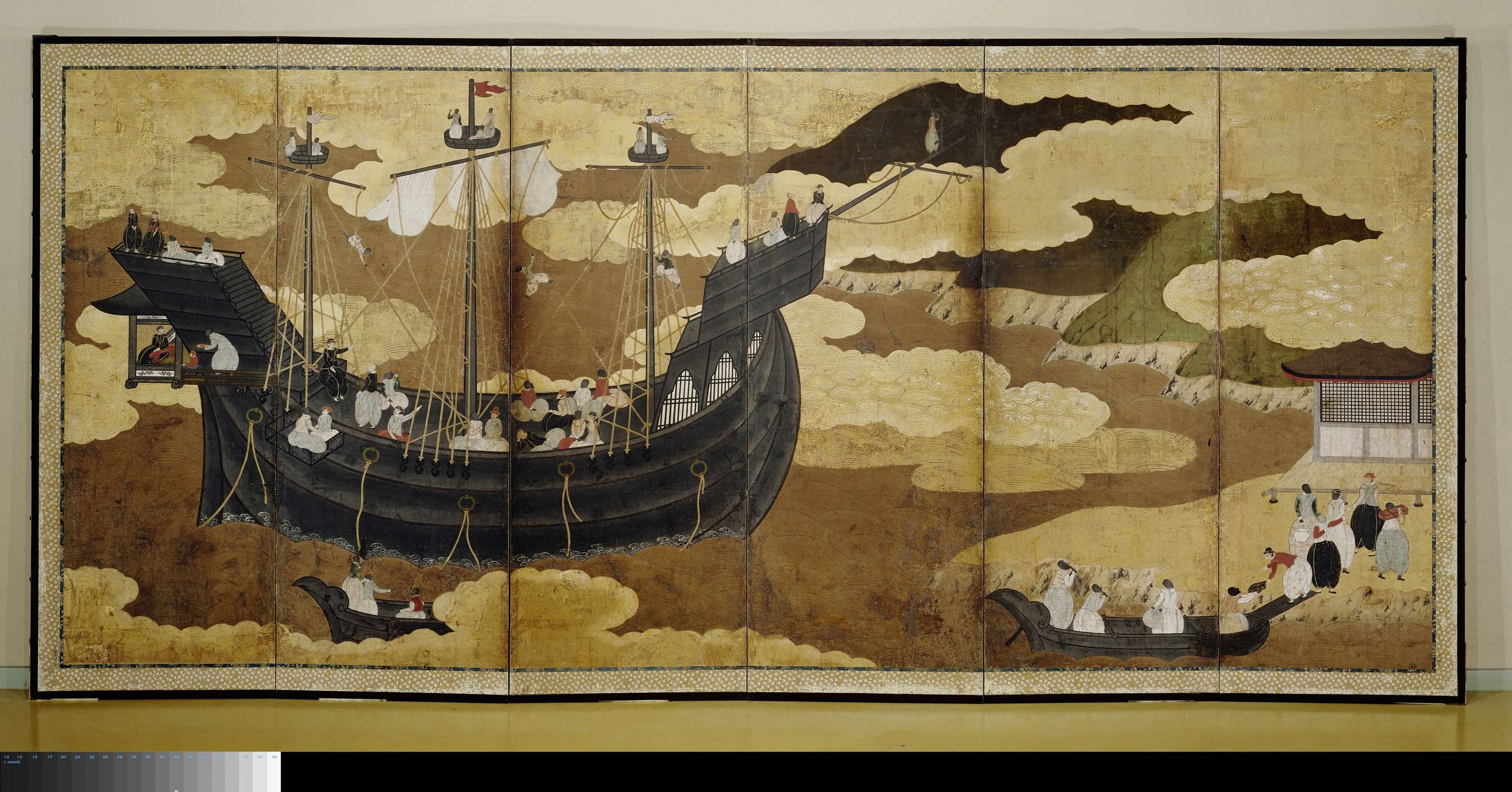 Folding screen depicting the arrival of a Portuguese ship in Nagasaki Harbour, gold medium, unknown artist