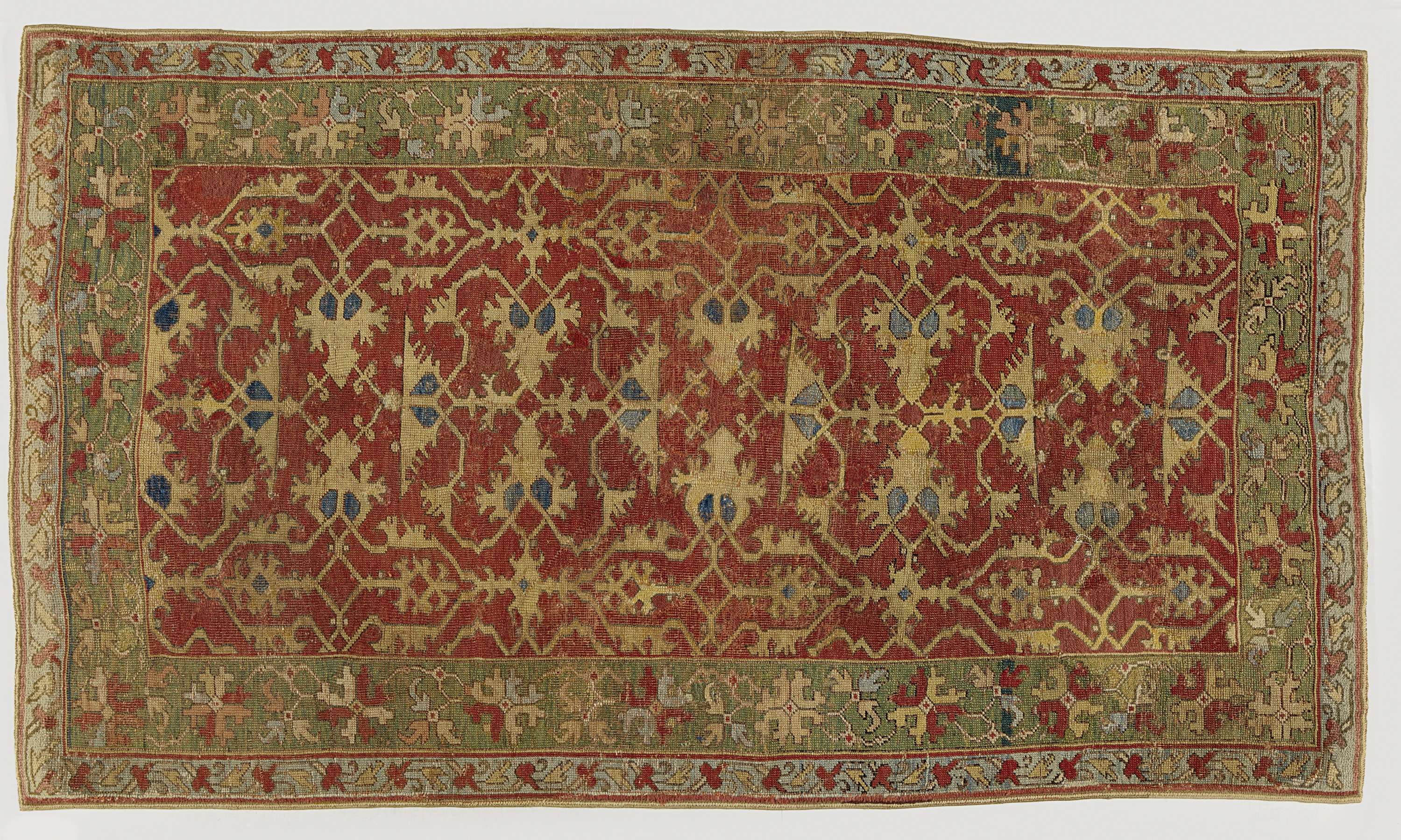 Wool carpet featuring intricate arabesques by unknown artist