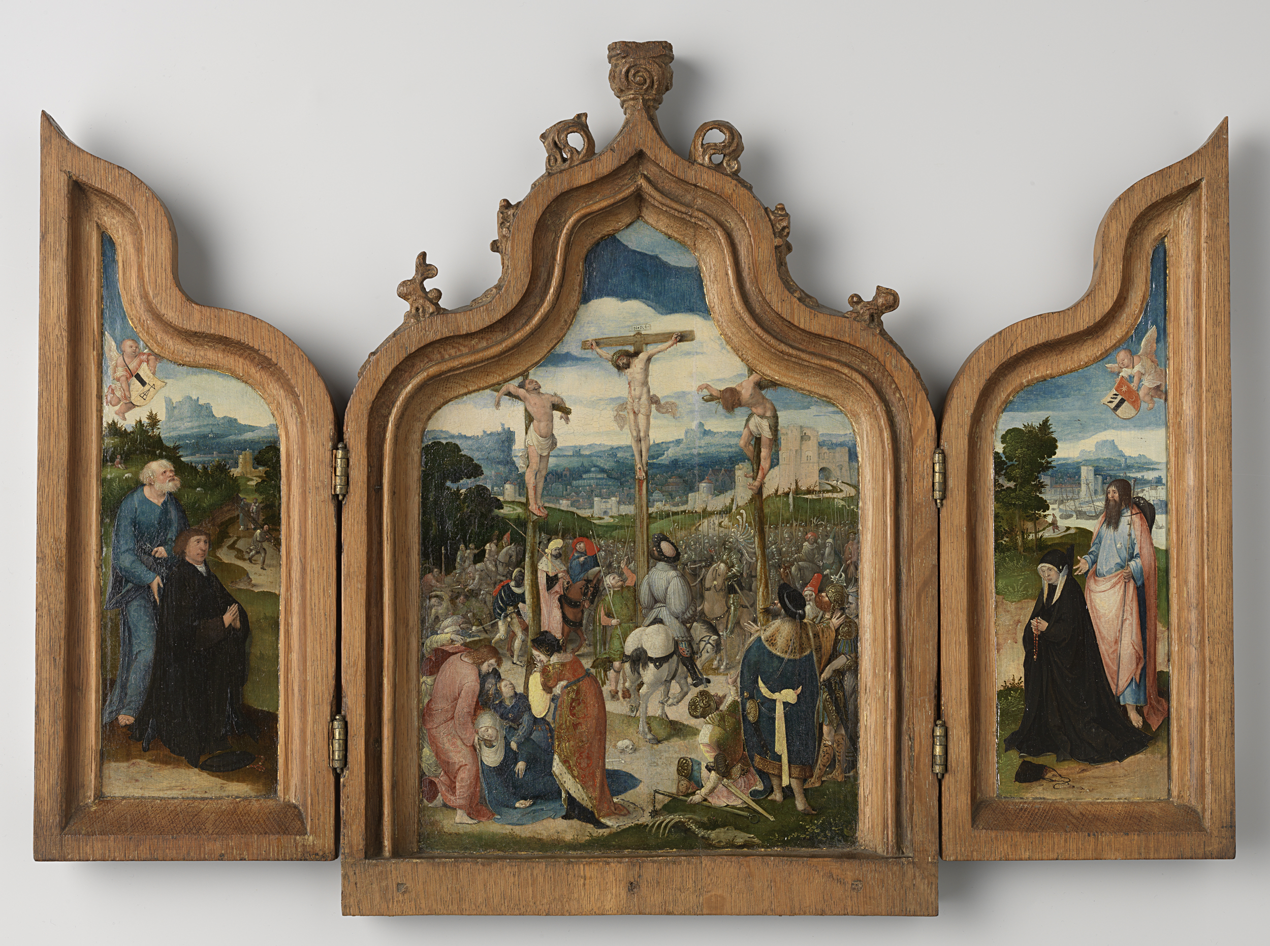 Triptych by Pseudo Jan Wellens de Cock, oil on panel depicting the Crucifixion with saints and donors.