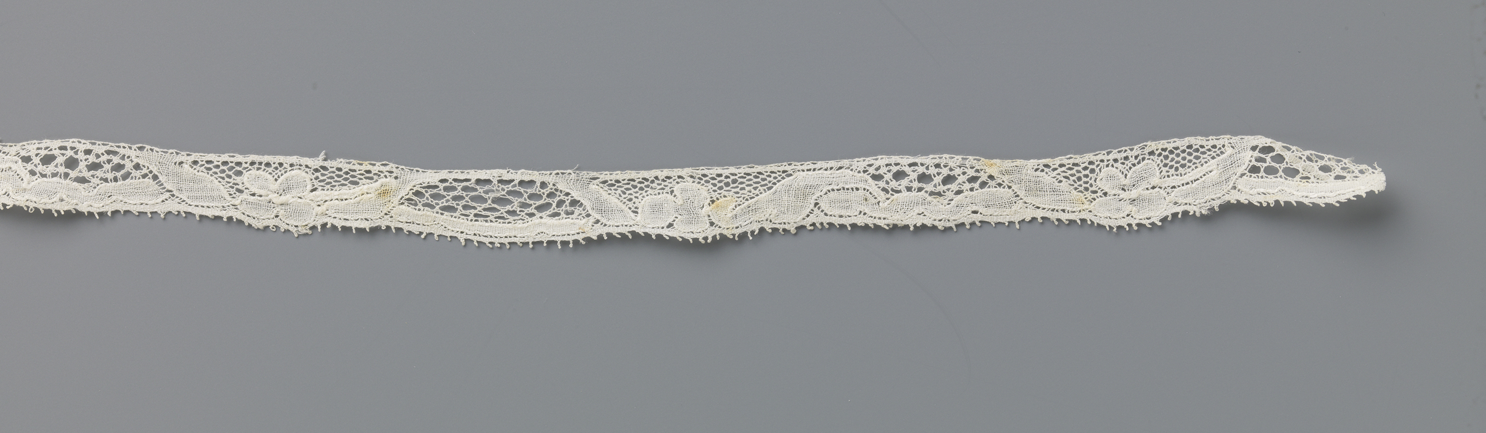 Lace work featuring a trapezoidal cartouche by Unknown Artist