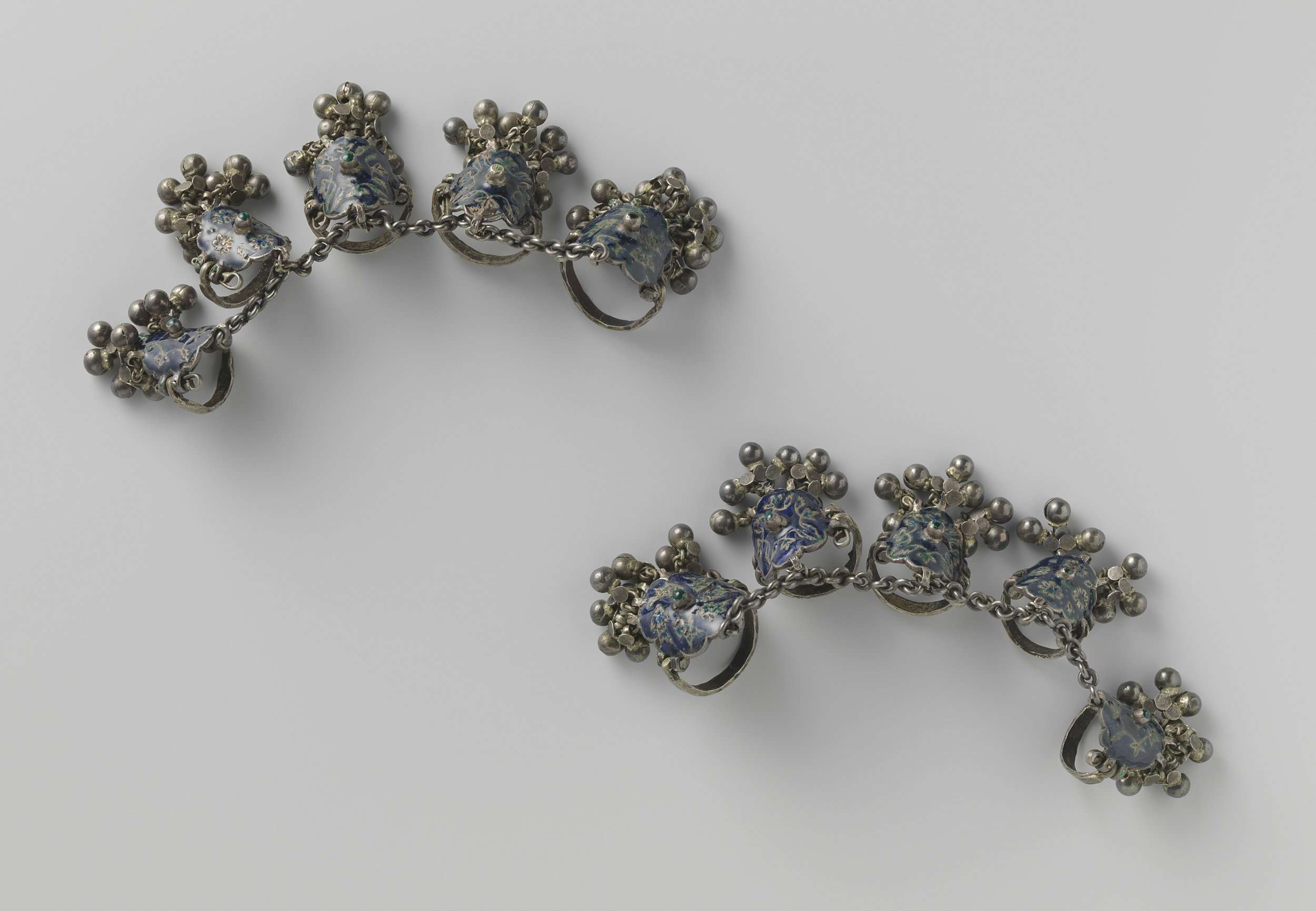 Toe jewellery in metal by Unknown Artist, featuring feet adorned with delicate jewellery.