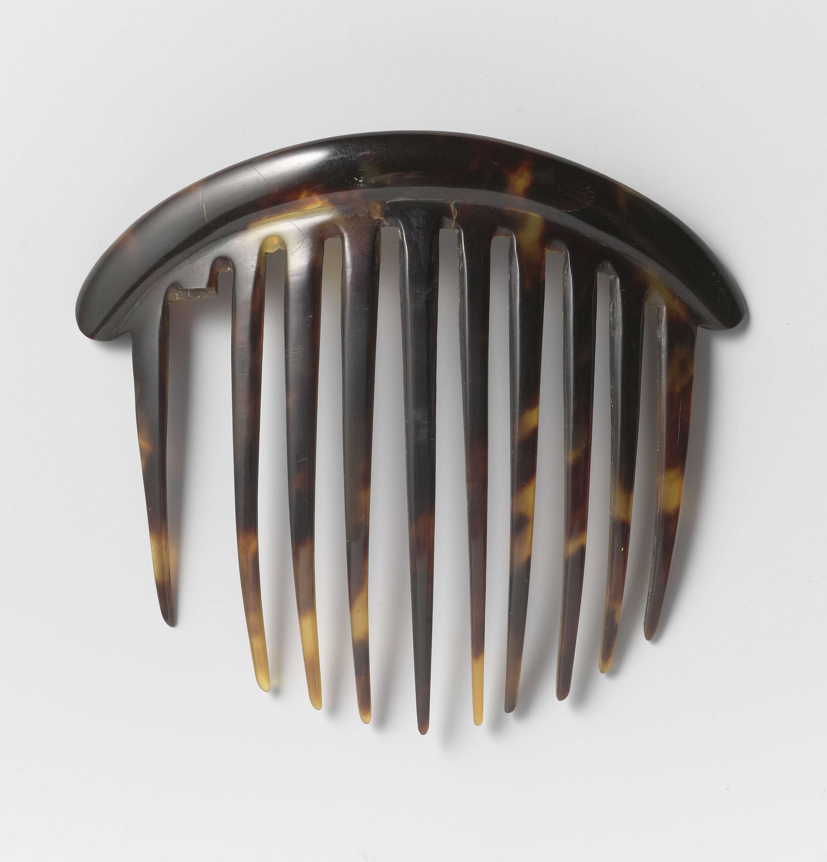 Decorative tortoiseshell and horn comb by Unknown Artist