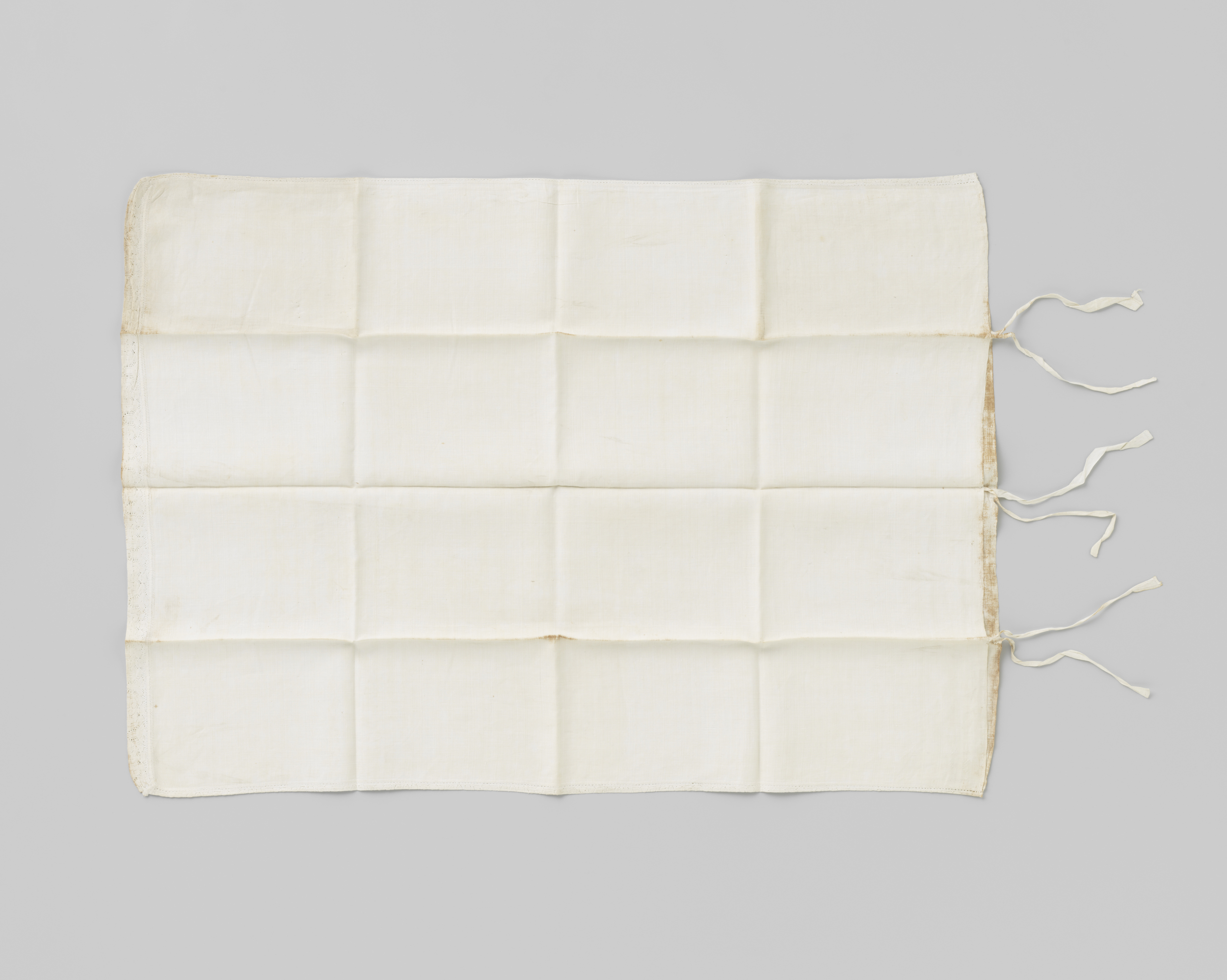 Decorative linen textile from 1663, featuring intricate patterns and colors.