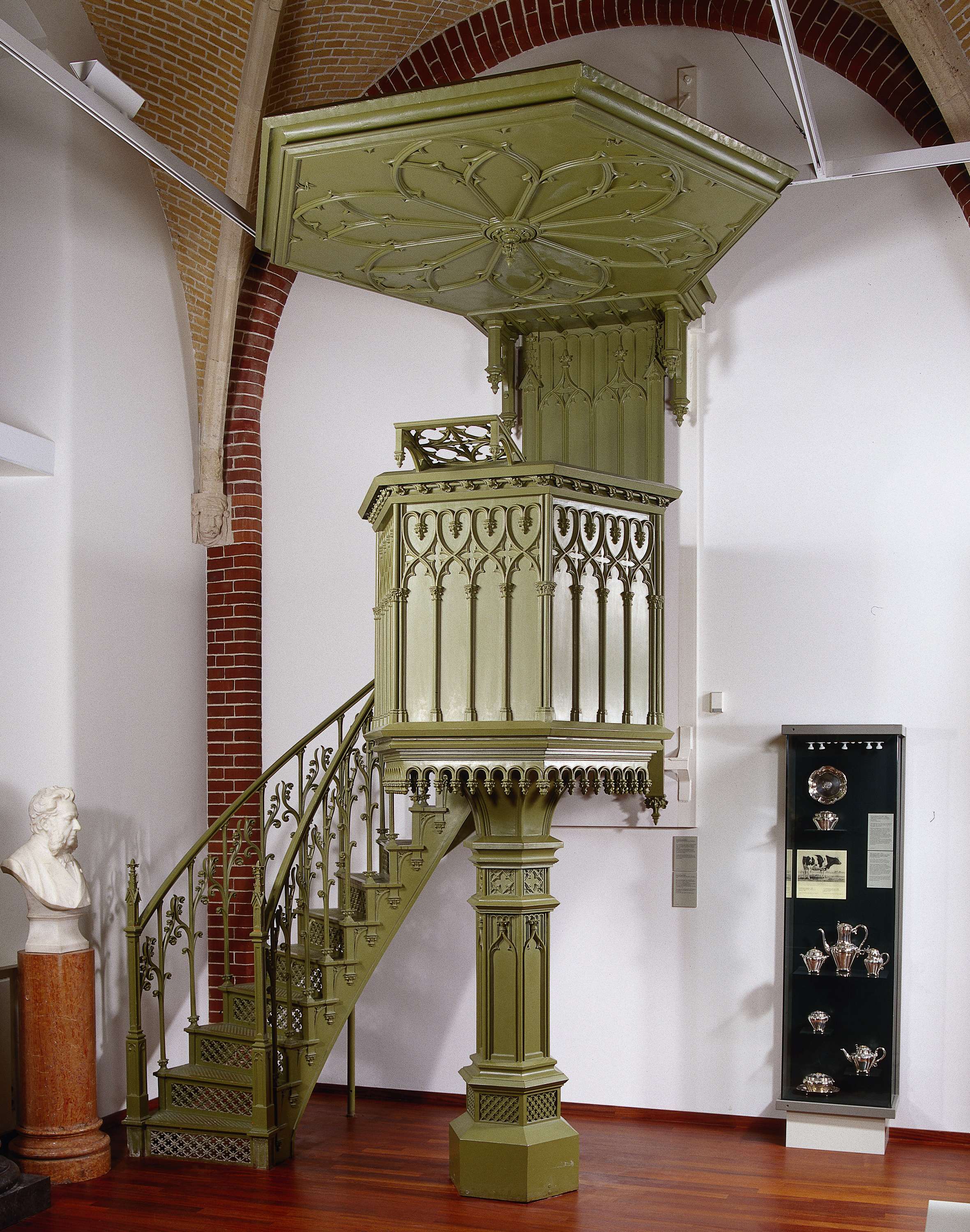 Pulpit with intricate ironwork by Enthoven & Co., Victorian style