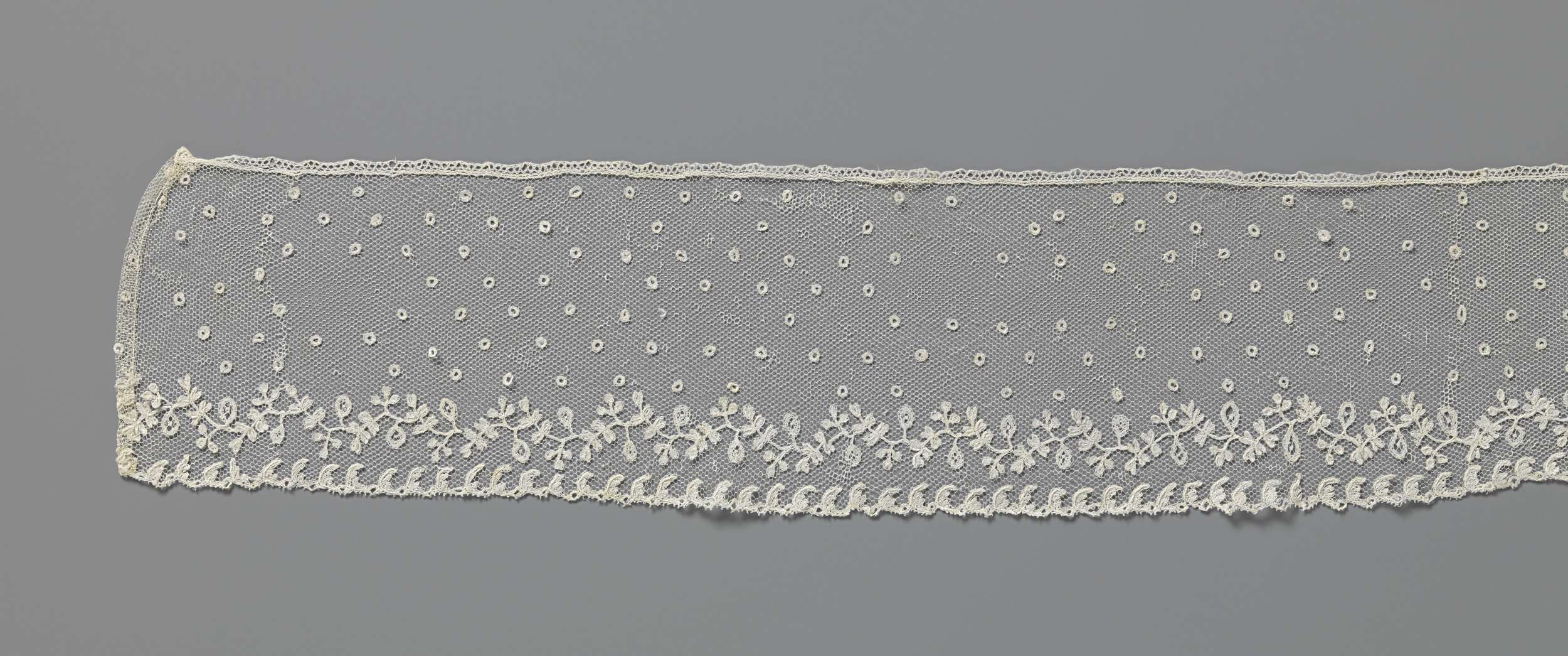 Lace work featuring a swirling vine by Unknown Artist