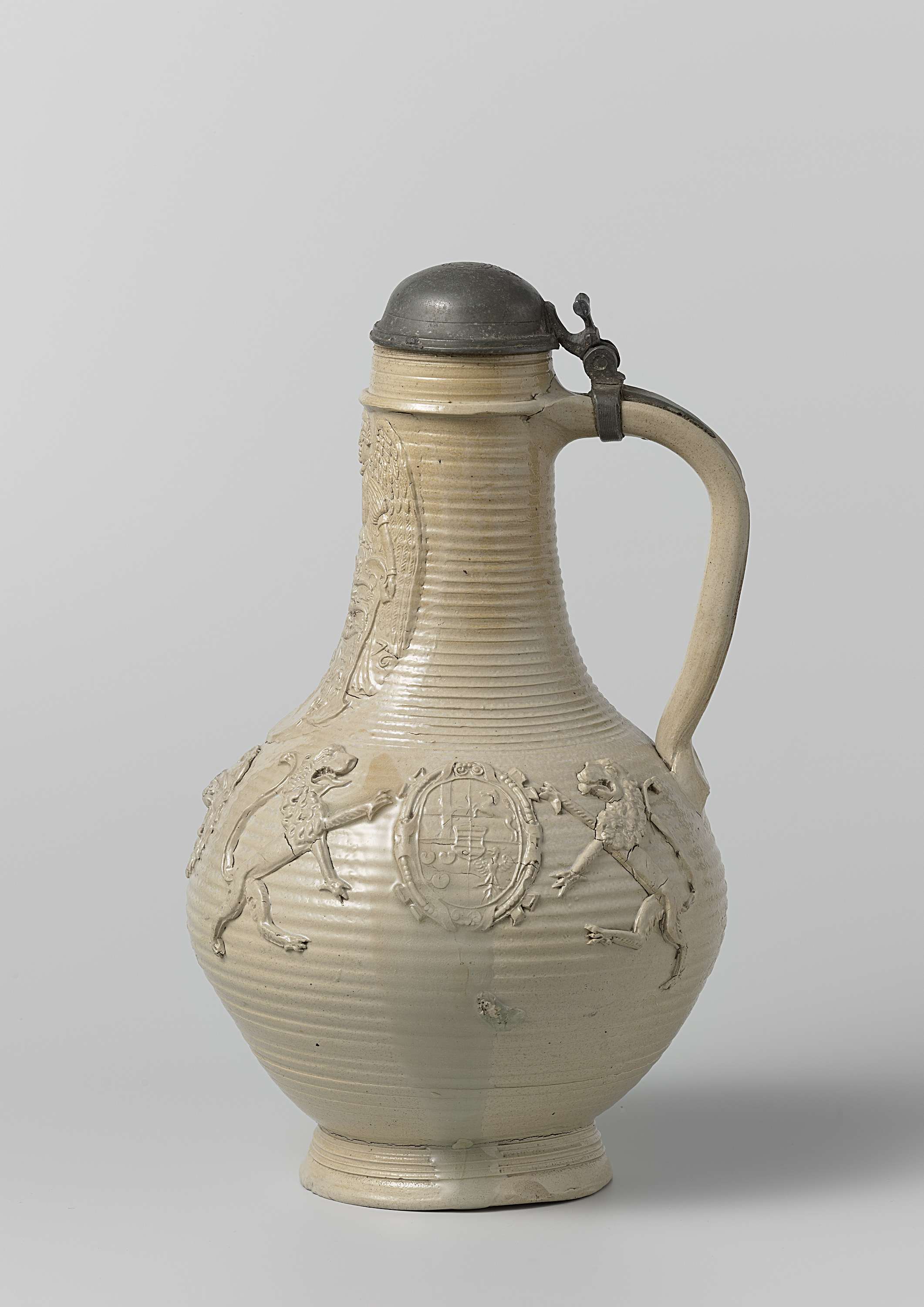 Decorative jug by Anno Knütgen, featuring angel and arms, 1576